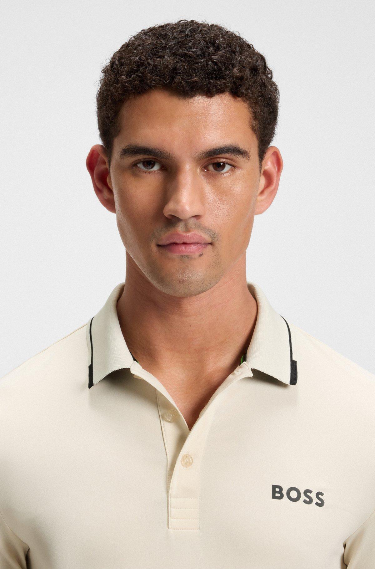 Slim-fit polo shirt with contrast logos Product Image