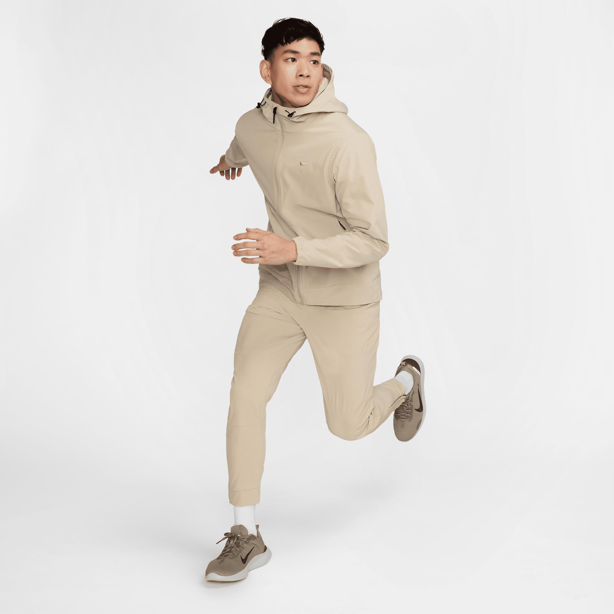 Nike Mens Unlimited Dri-FIT Zippered Cuff Versatile Pants | FB7548-320 Product Image