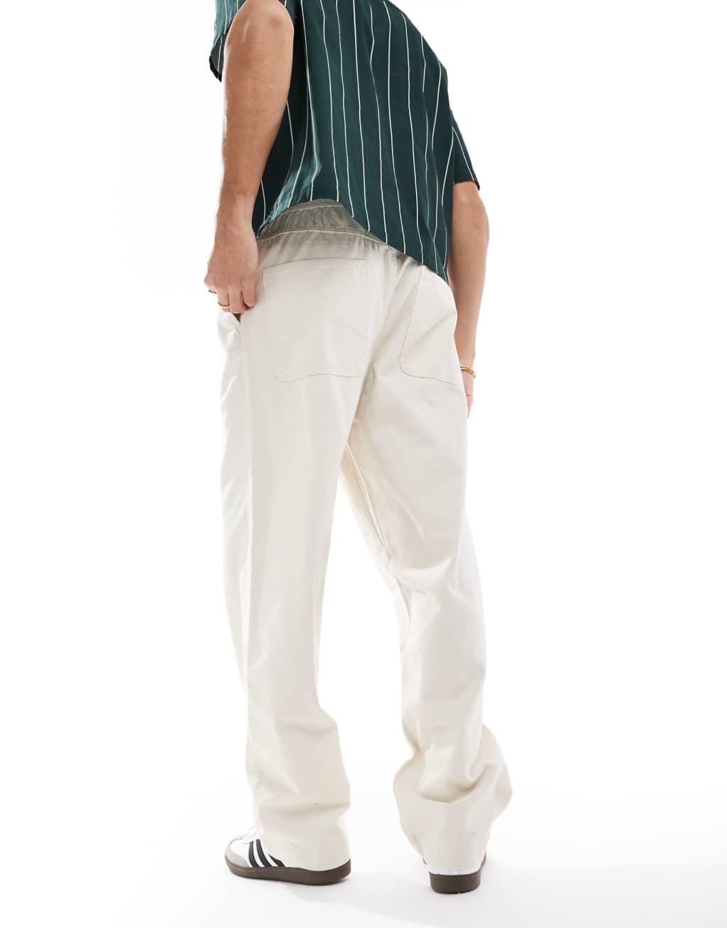ASOS DESIGN baggy pull on pants with back pocket patch in ecru Product Image