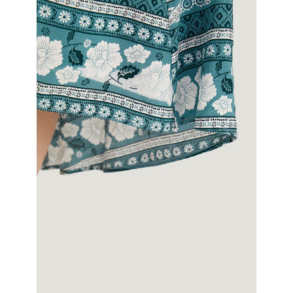 Plus Size Floral Print Pocket Surplice Neck Ruffle Trim Dress Turquoise Women Vacation Elastic cuffs V-neck Elbow-length sleeve Curvy Midi Dress BloomChic 14-16/1X Product Image