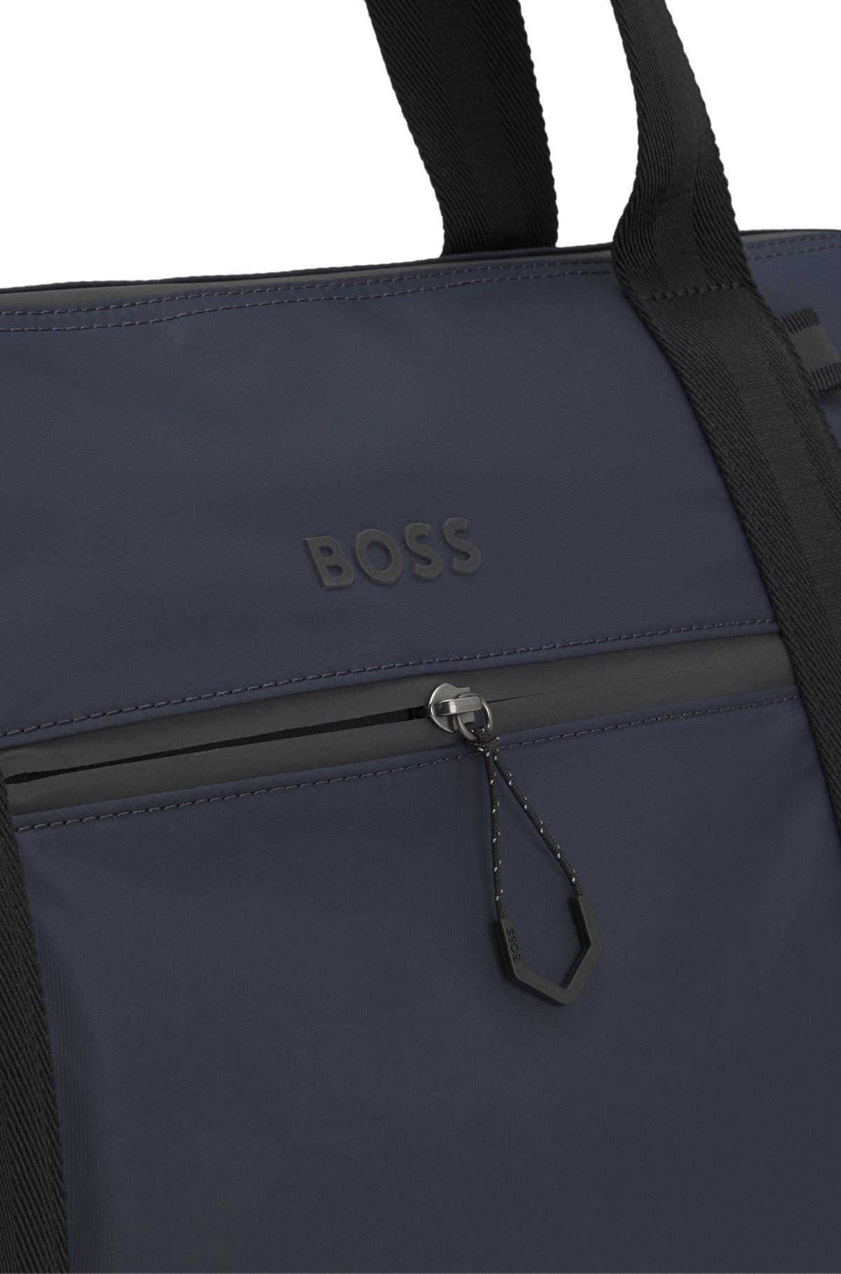 Reflective-detail holdall in faux leather Product Image