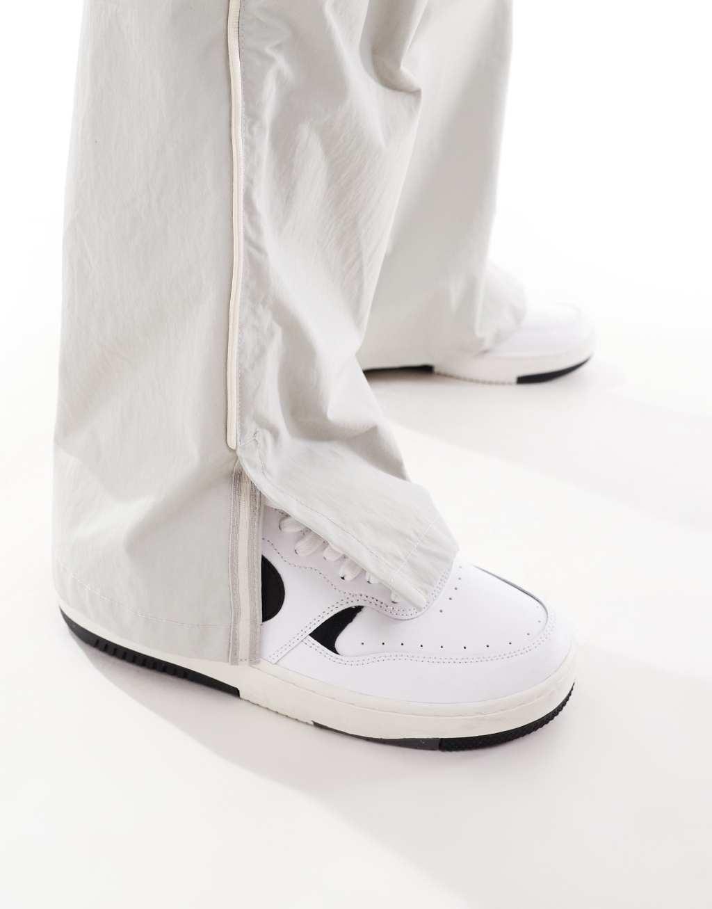 Nike Collection ASYM pants in gray Product Image