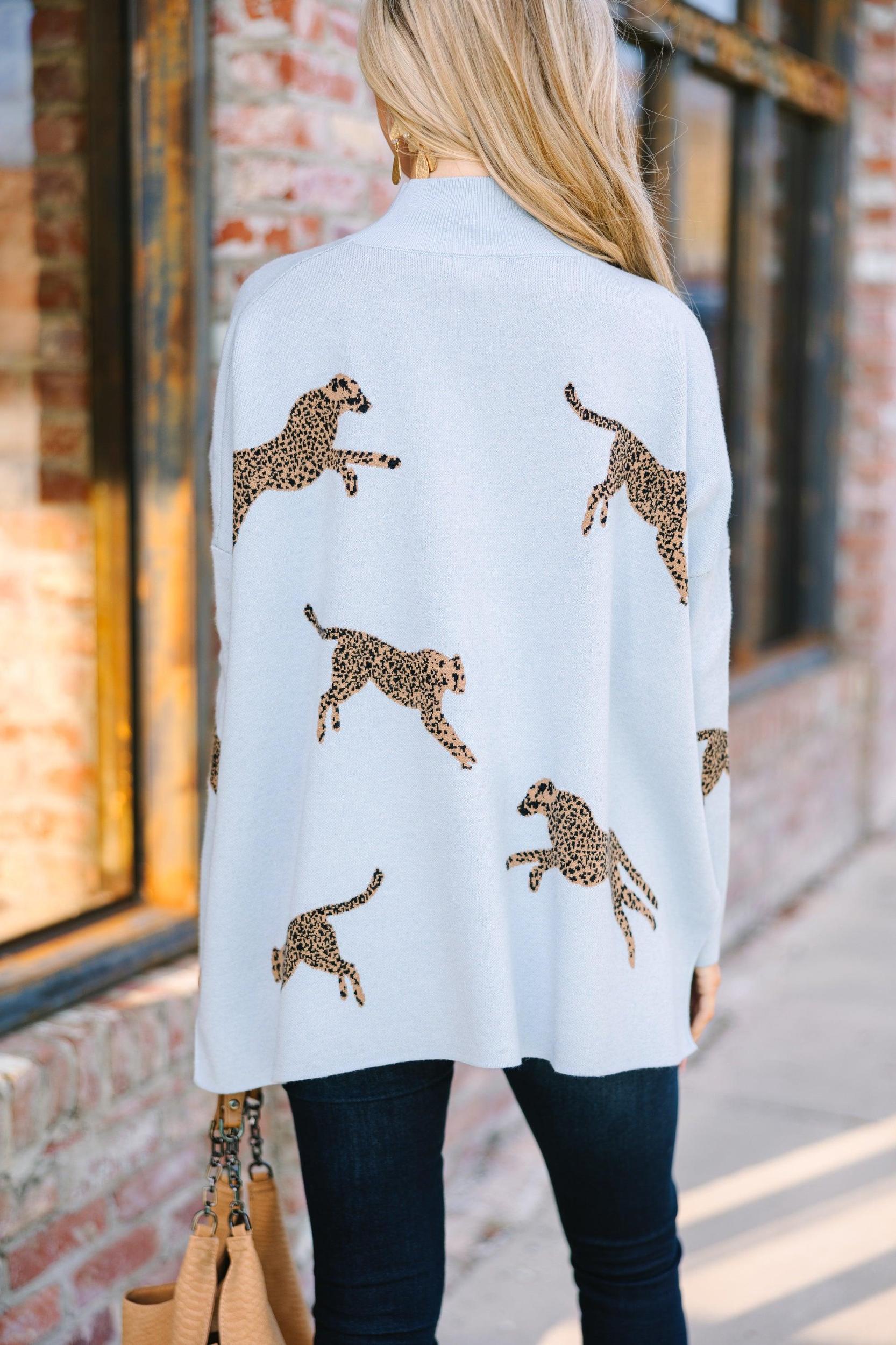 Quick Decisions Light Blue Cheetah Sweater Female Product Image