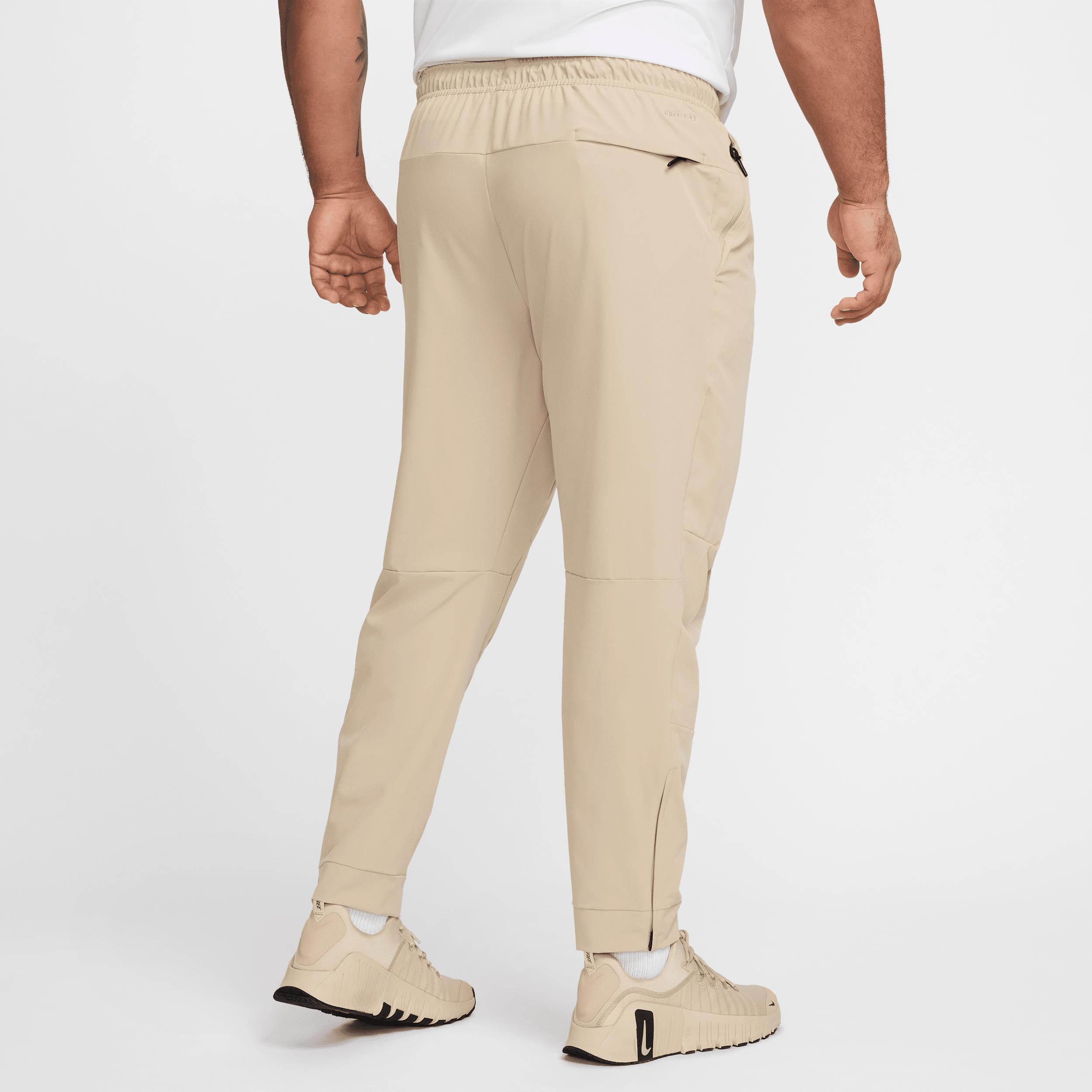 Nike Mens Unlimited Dri-FIT Zippered Cuff Versatile Pants | FB7548-320 Product Image