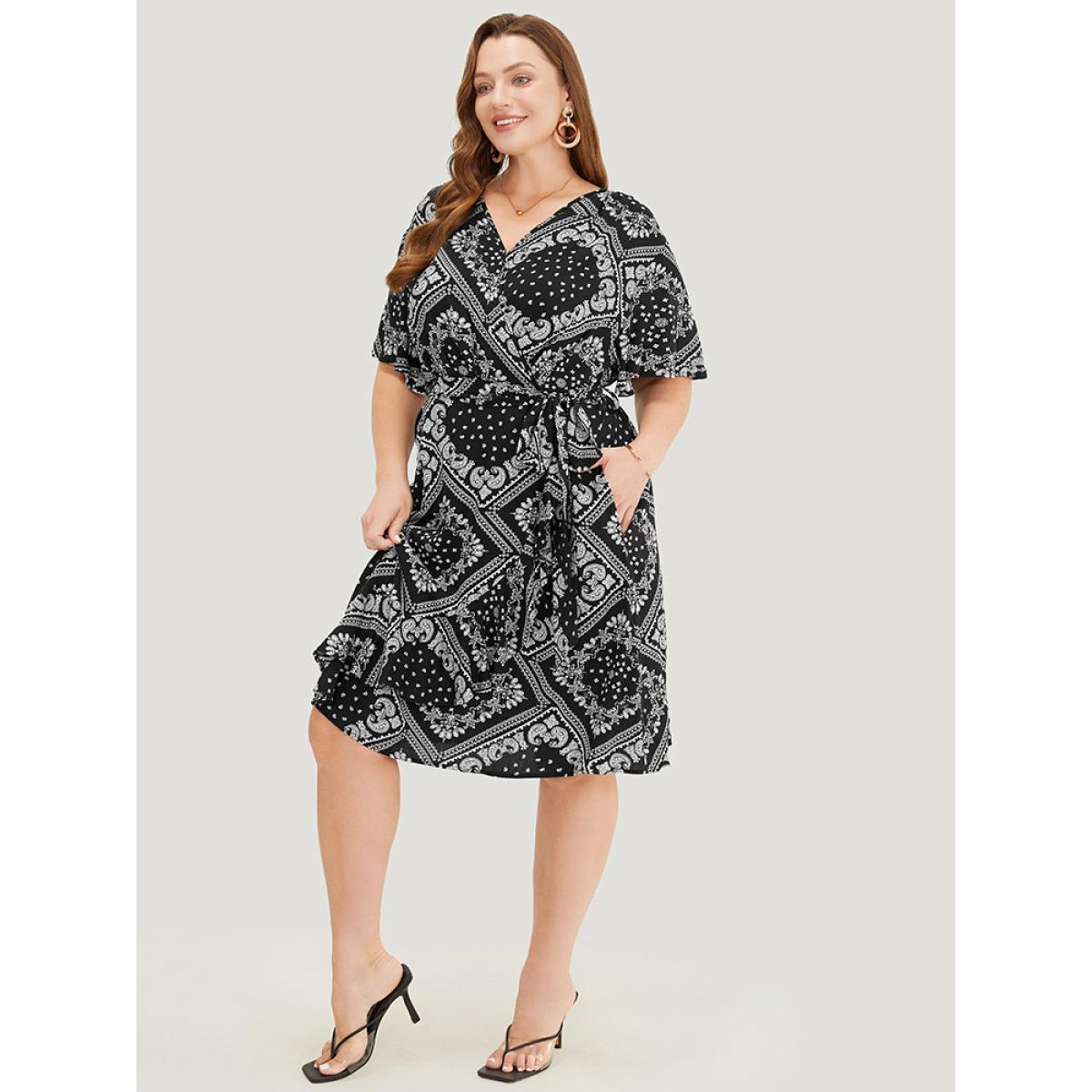 Plus Size Paisley Print Pocket Belted Wrap Flutter Sleeve Dress BlackFlower Women Vacation Wrap V-neck Short sleeve Curvy Knee Dress BloomChic 28/5X Product Image