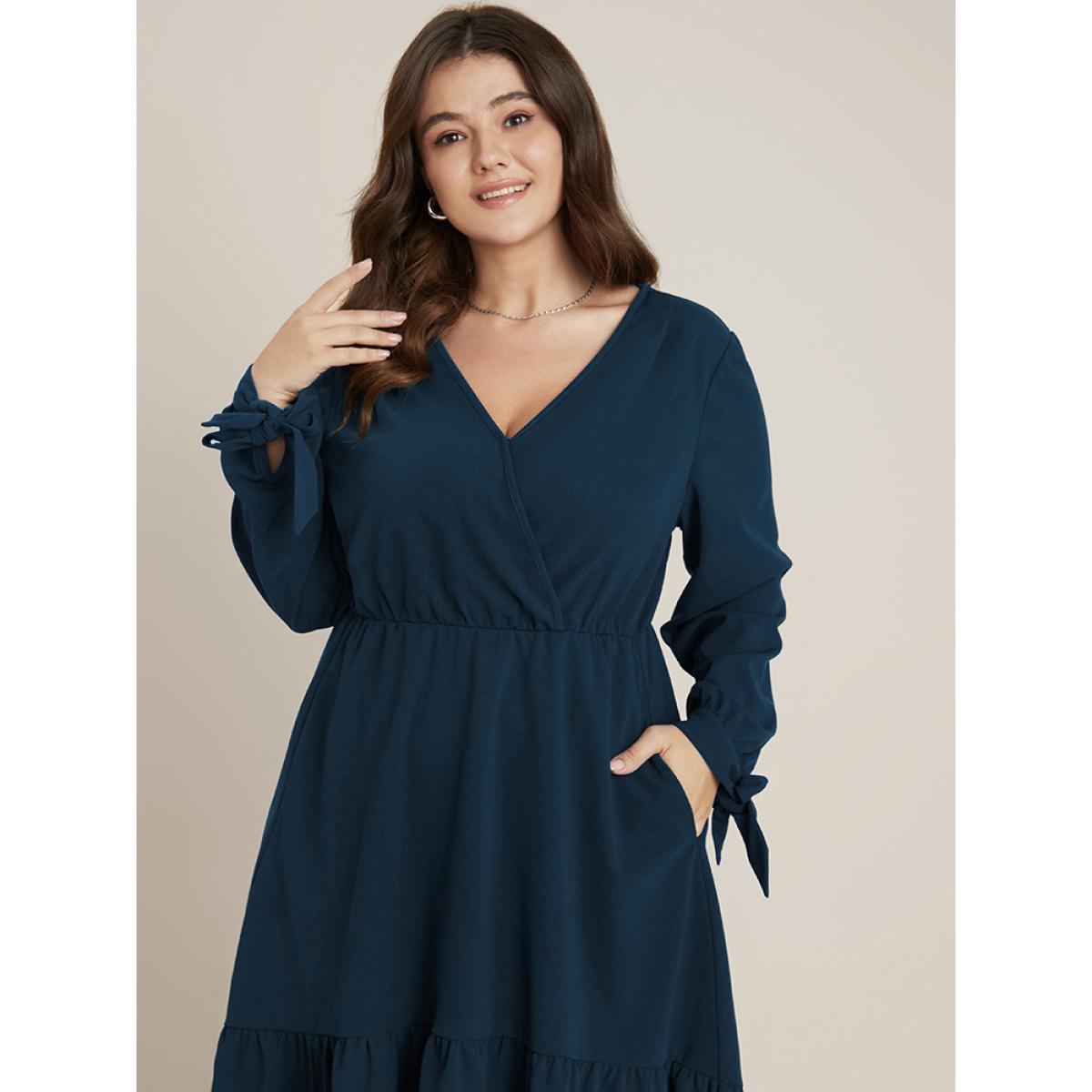 Plus Size Solid Knotted Sleeve Pocket Wrap Ruffle Asymmetrical Hem Dress Aegean Women Office Plain V-neck Long Sleeve Curvy Midi Dress BloomChic 14-16/1X Product Image