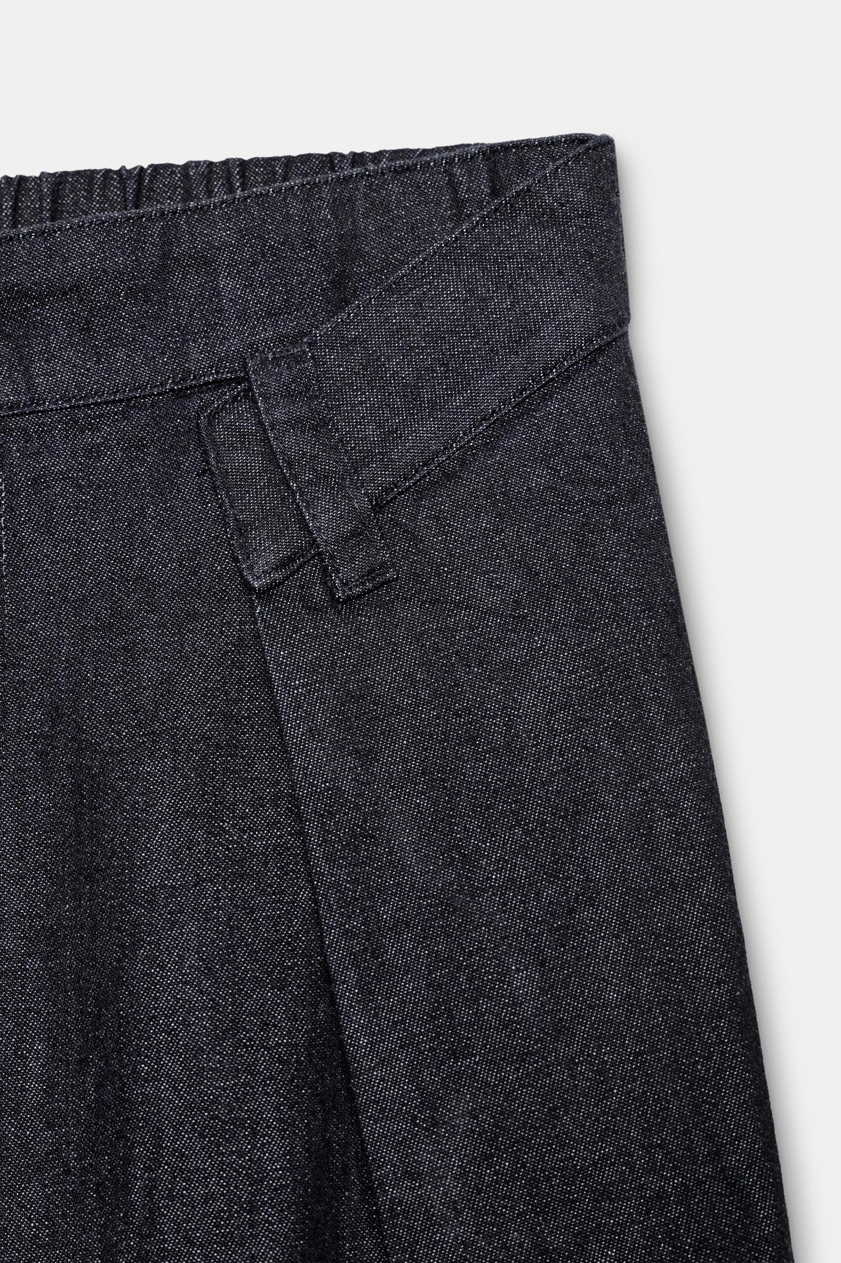 PLEATED FAUX DENIM PANTS Product Image