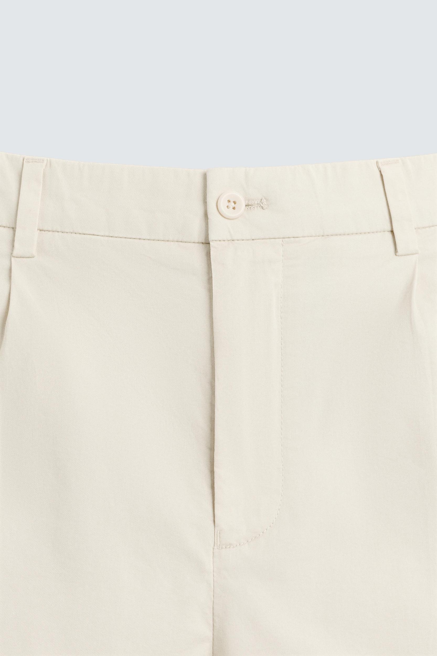 REGULAR FIT PLEATED BERMUDA SHORTS Product Image