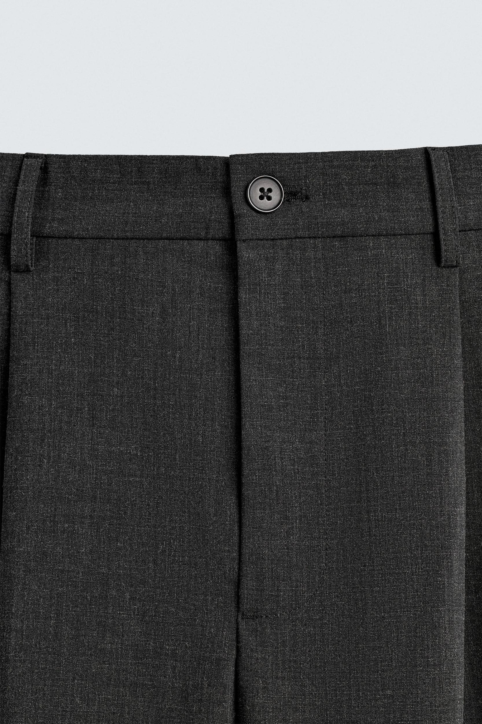 PLEATED WIDE FIT PANTS Product Image