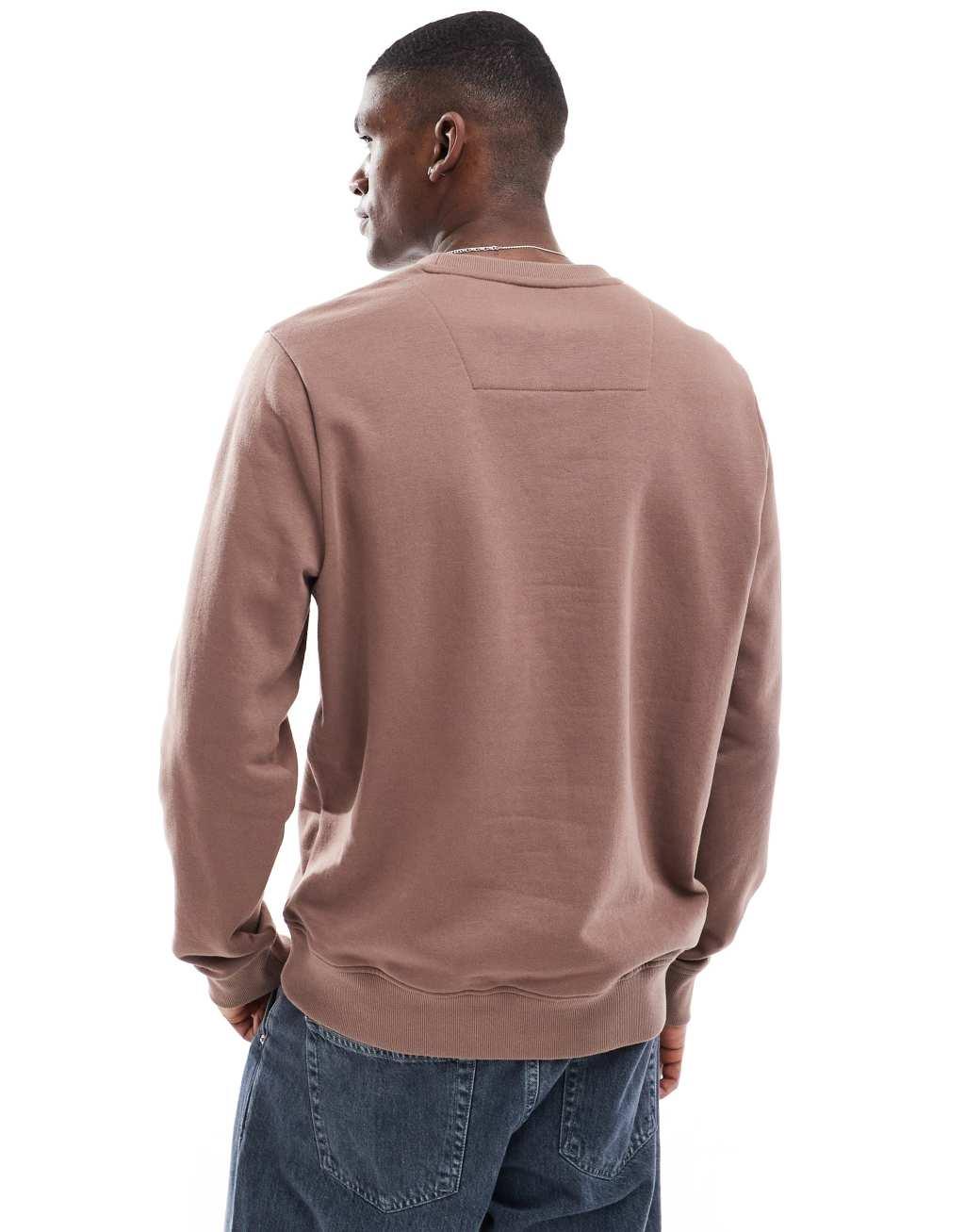 Threadbare chest print fleece sweatshirt in brown Product Image