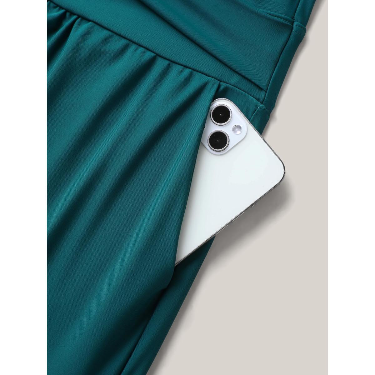 Plus Size Twist Front Pockets Swim Romper Women's Swimwear Cyan Resort Twist Curve Bathing Suits High stretch One Pieces BloomChic 10/M Product Image