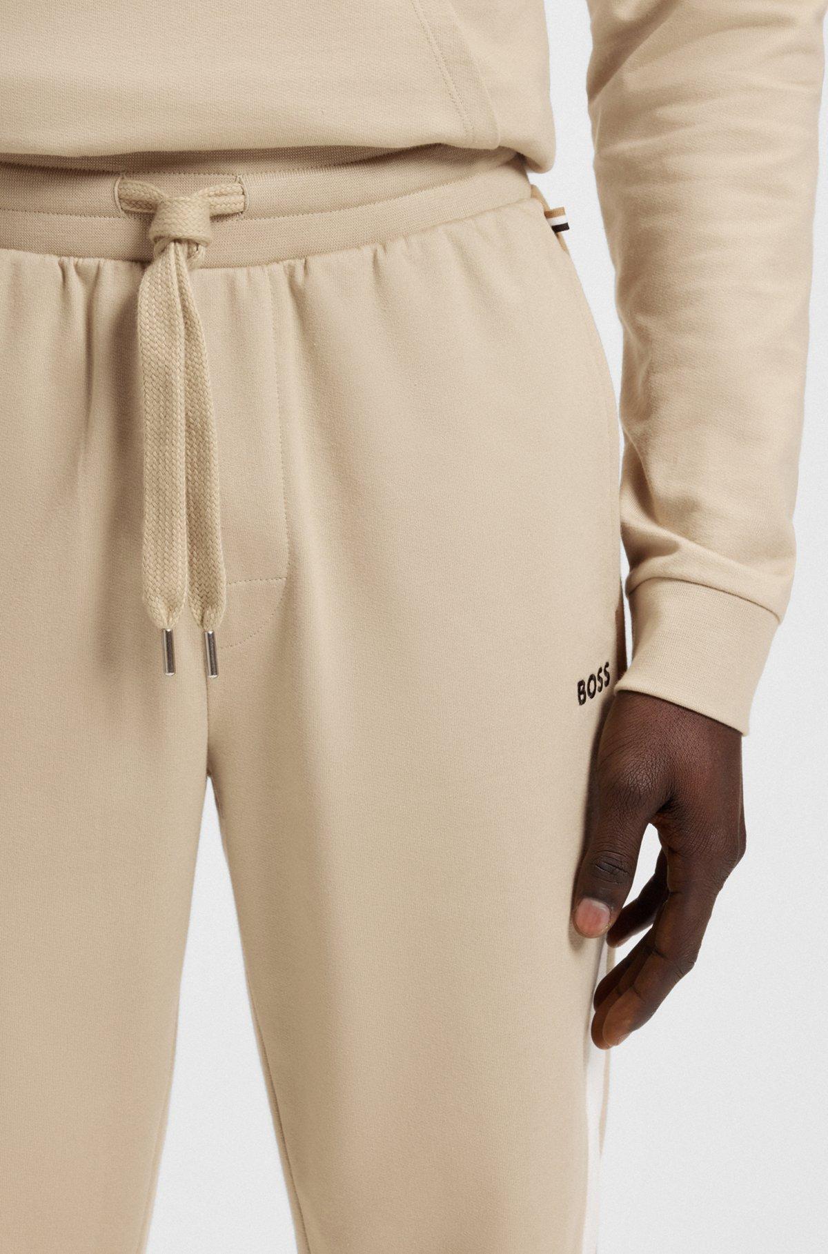 Cotton-terry tracksuit bottoms with contrast side panels Product Image