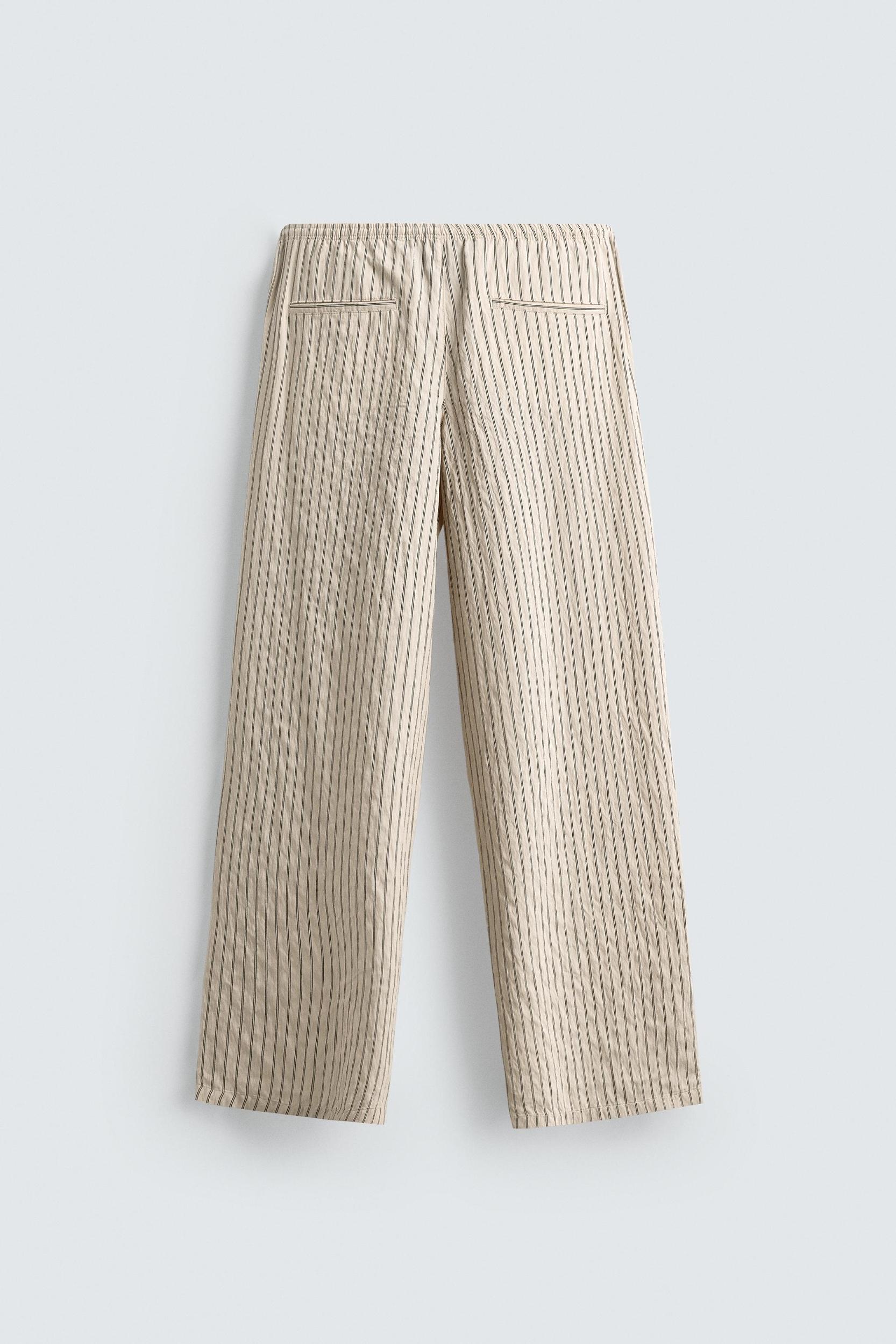 WRINKLED EFFECT STRIPED FLOWY PANTS Product Image