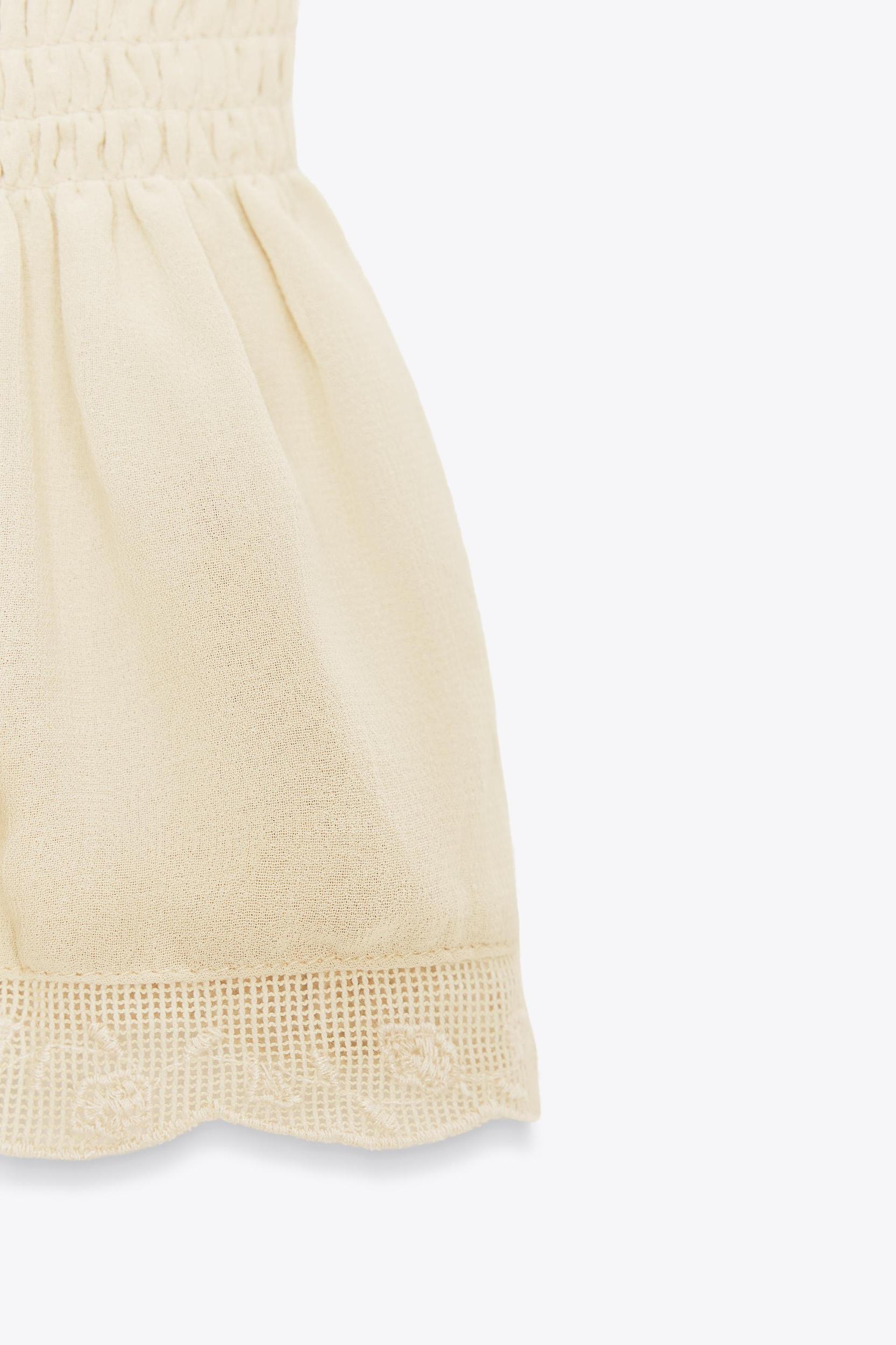 SMOCKED COMBINATION TOP Product Image