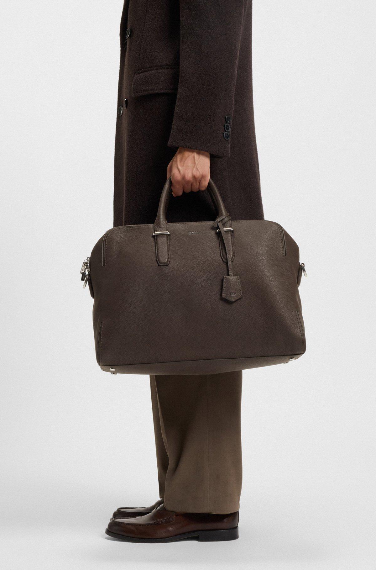 Grained-leather holdall with embossed logo Product Image