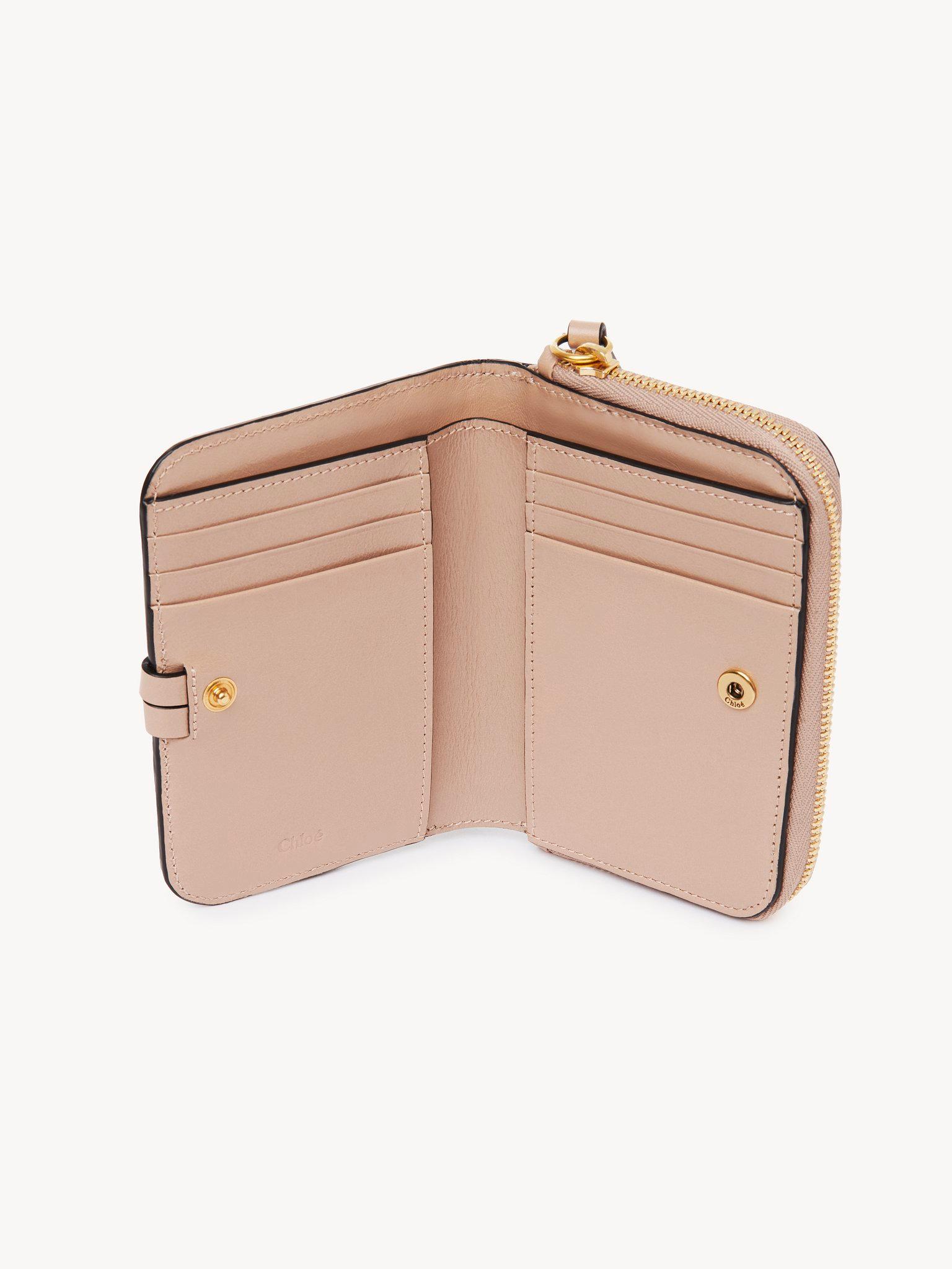 Alphabet bifold wallet in shiny leather Product Image