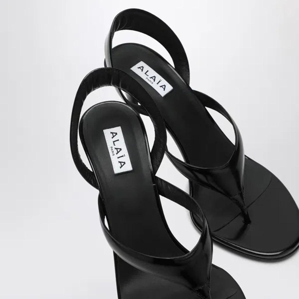 ALAÏA Leather Thong Slingback Sandals In Noir Product Image
