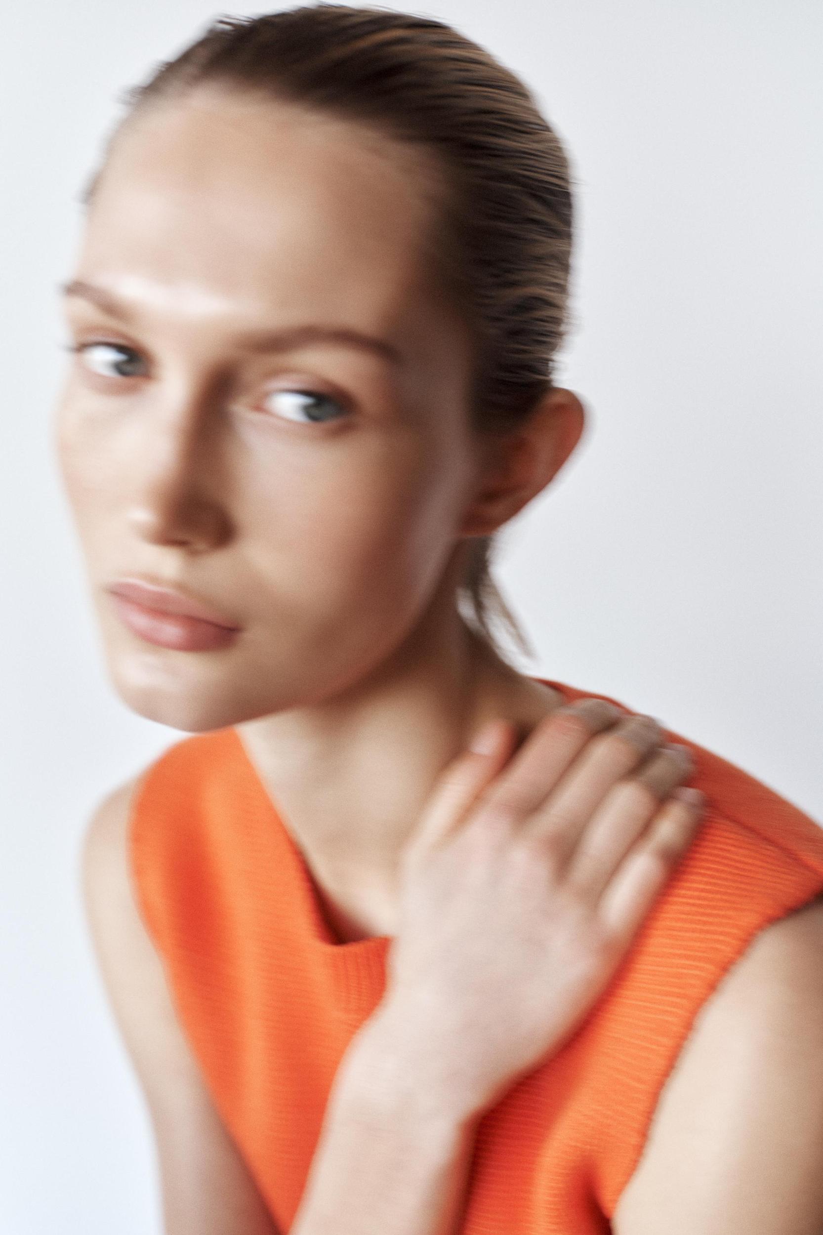 KNIT PEPLUM TOP Product Image