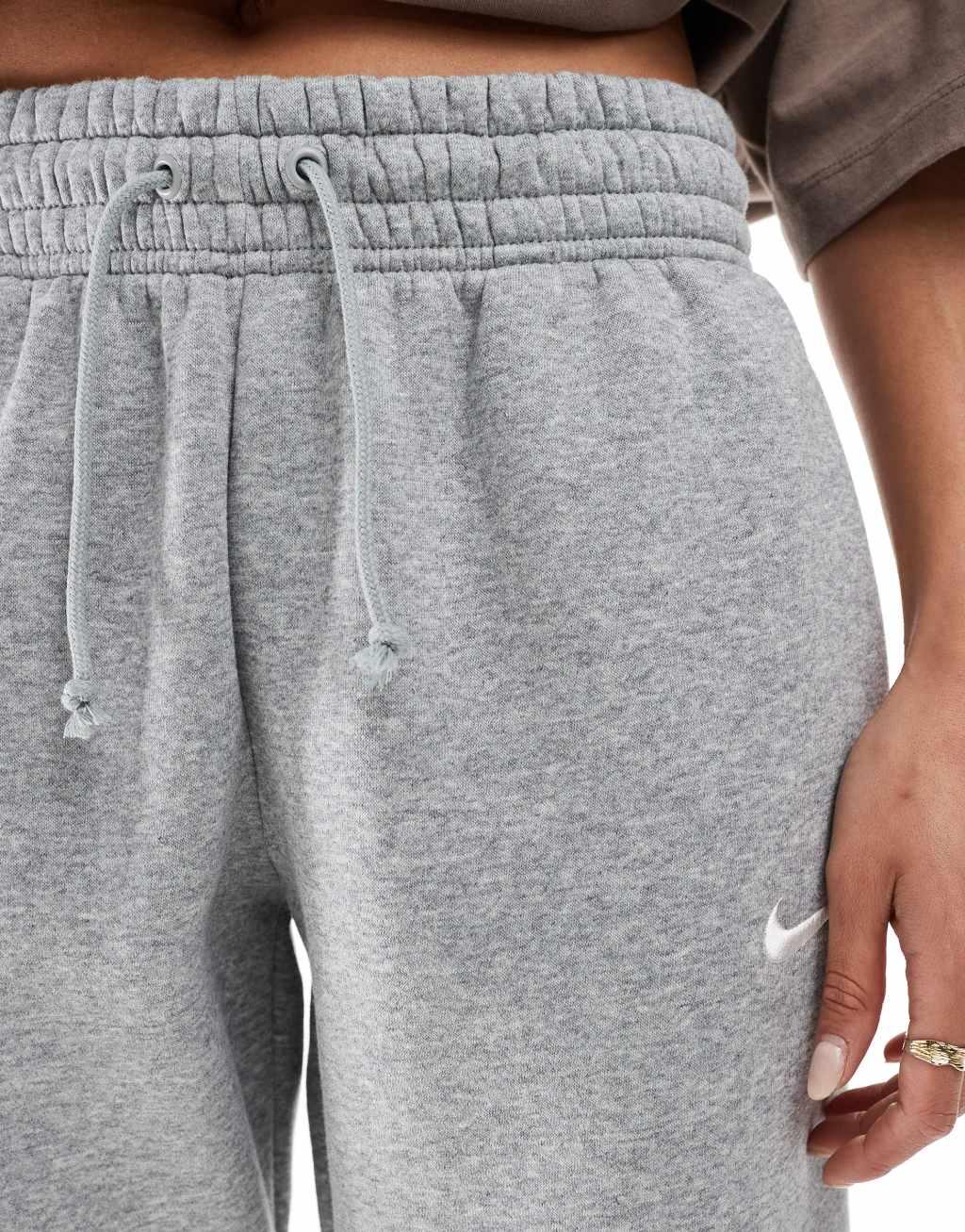Nike Phoenix Fleece cuffed sweatpants in gray Product Image