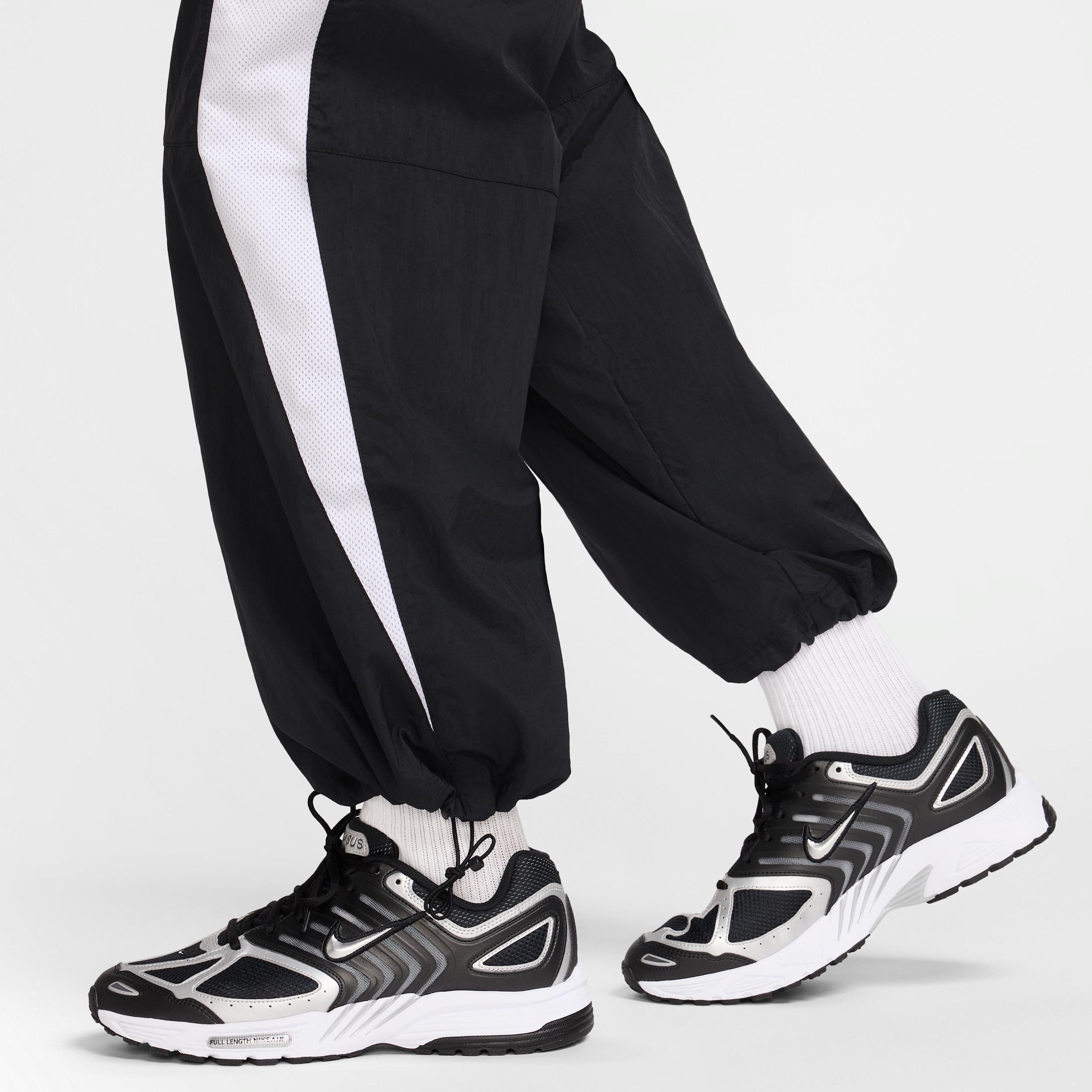 Nike Air Woven Nylon Pant Mens at Urban Outfitters Product Image