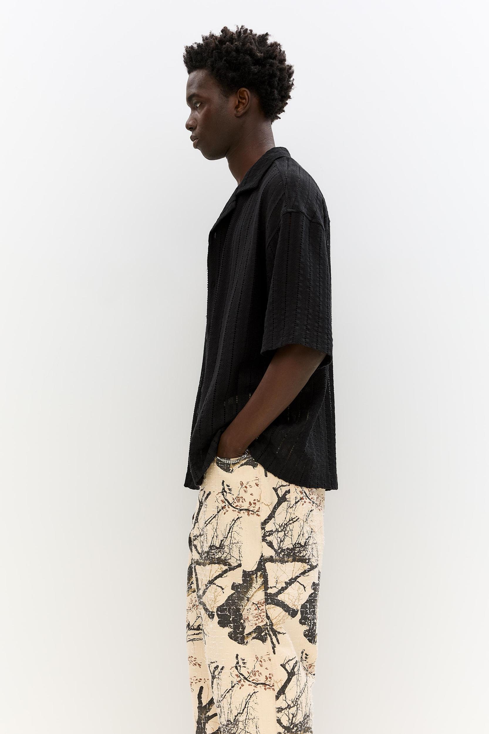 Black textured short sleeve shirt Product Image