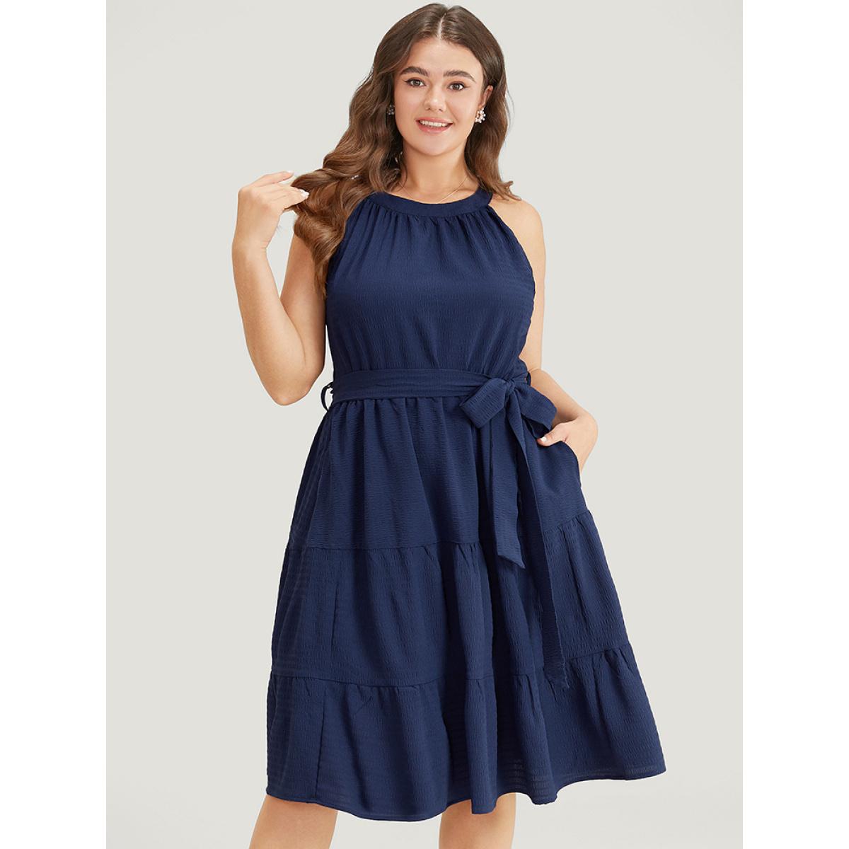 Plus Size Solid Knot Halter Pocket Belted Ruffles Tiered Hem Dress Indigo Women Elegant Gathered Halter neck Sleeveless Curvy Knee Dress BloomChic 12/L Product Image