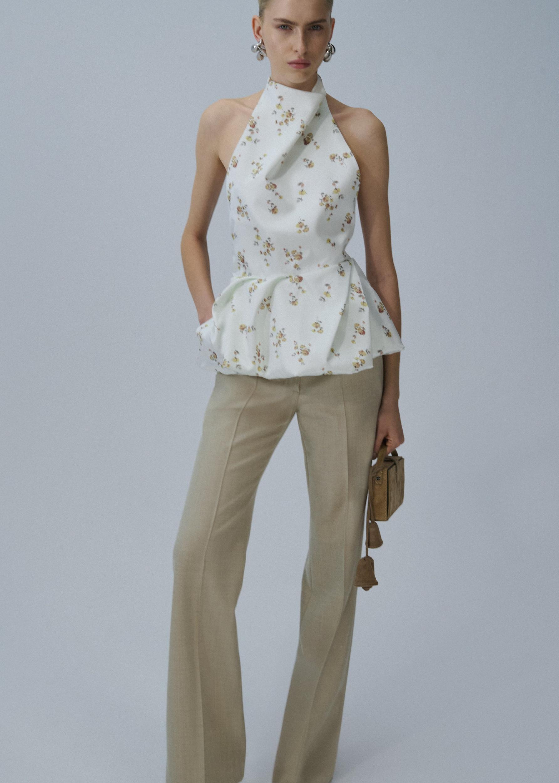 Halter peplum top in cream print Product Image