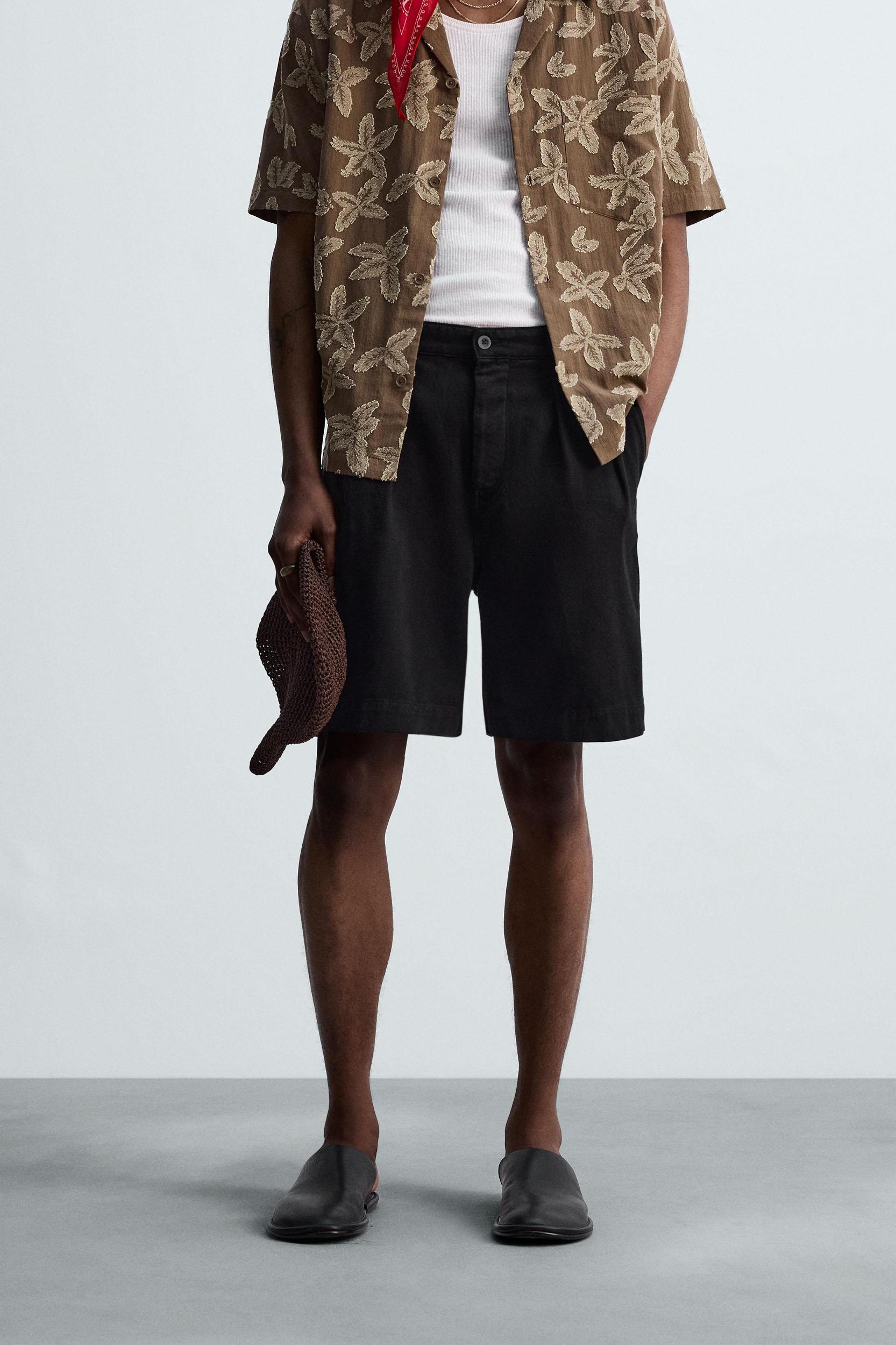 RELAXED FIT PLEATED BERMUDA SHORTS Product Image