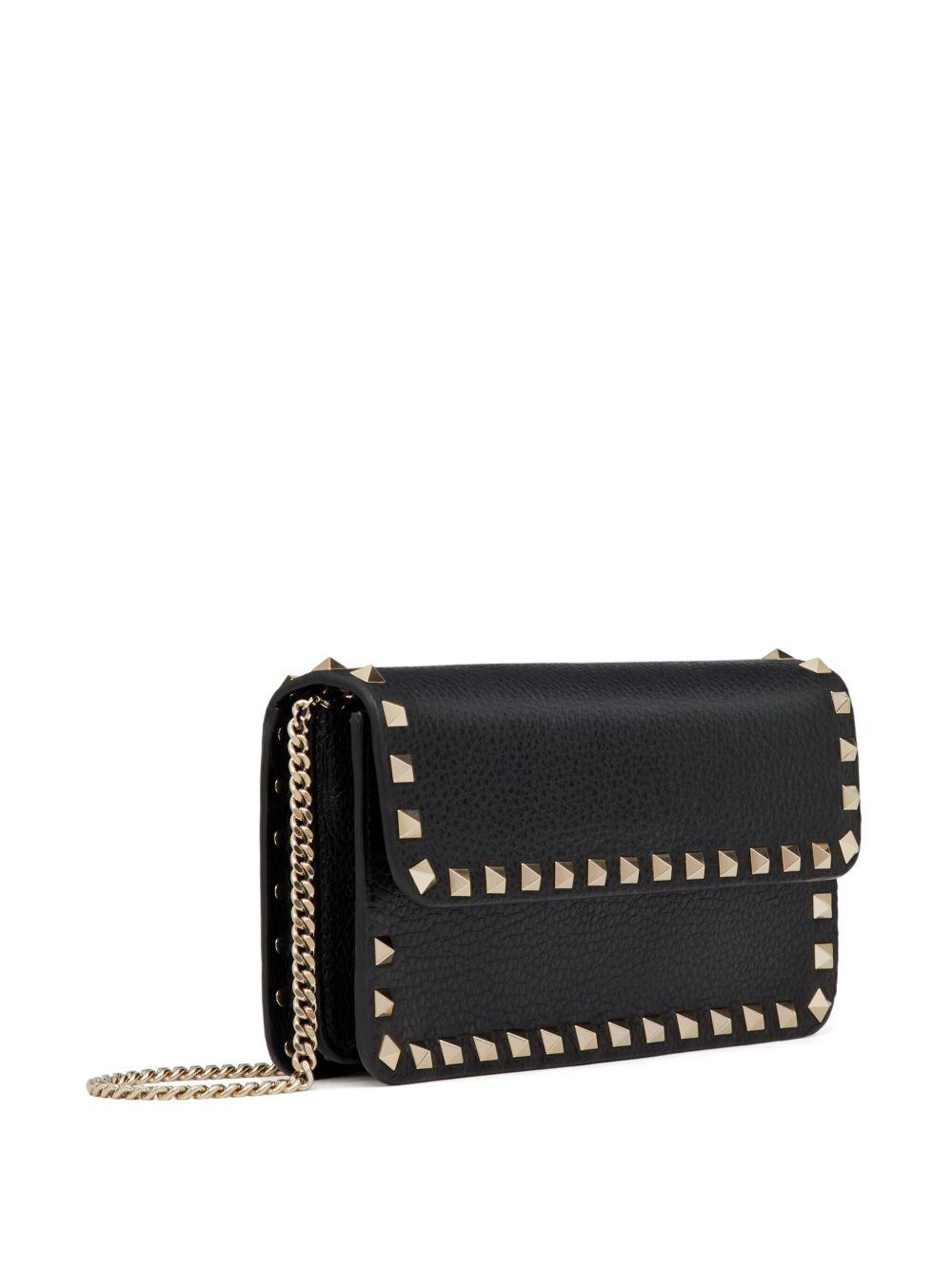 Rockstud leather clutch bag Product Image