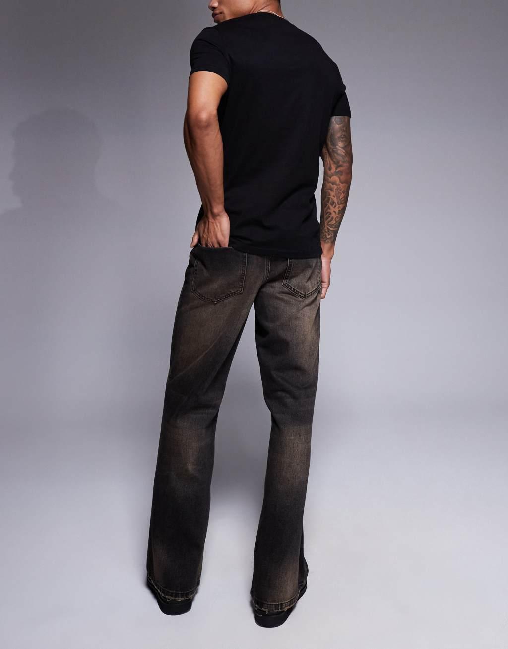 ASOS DESIGN wide flare fit jeans with brown tint in washed black Product Image
