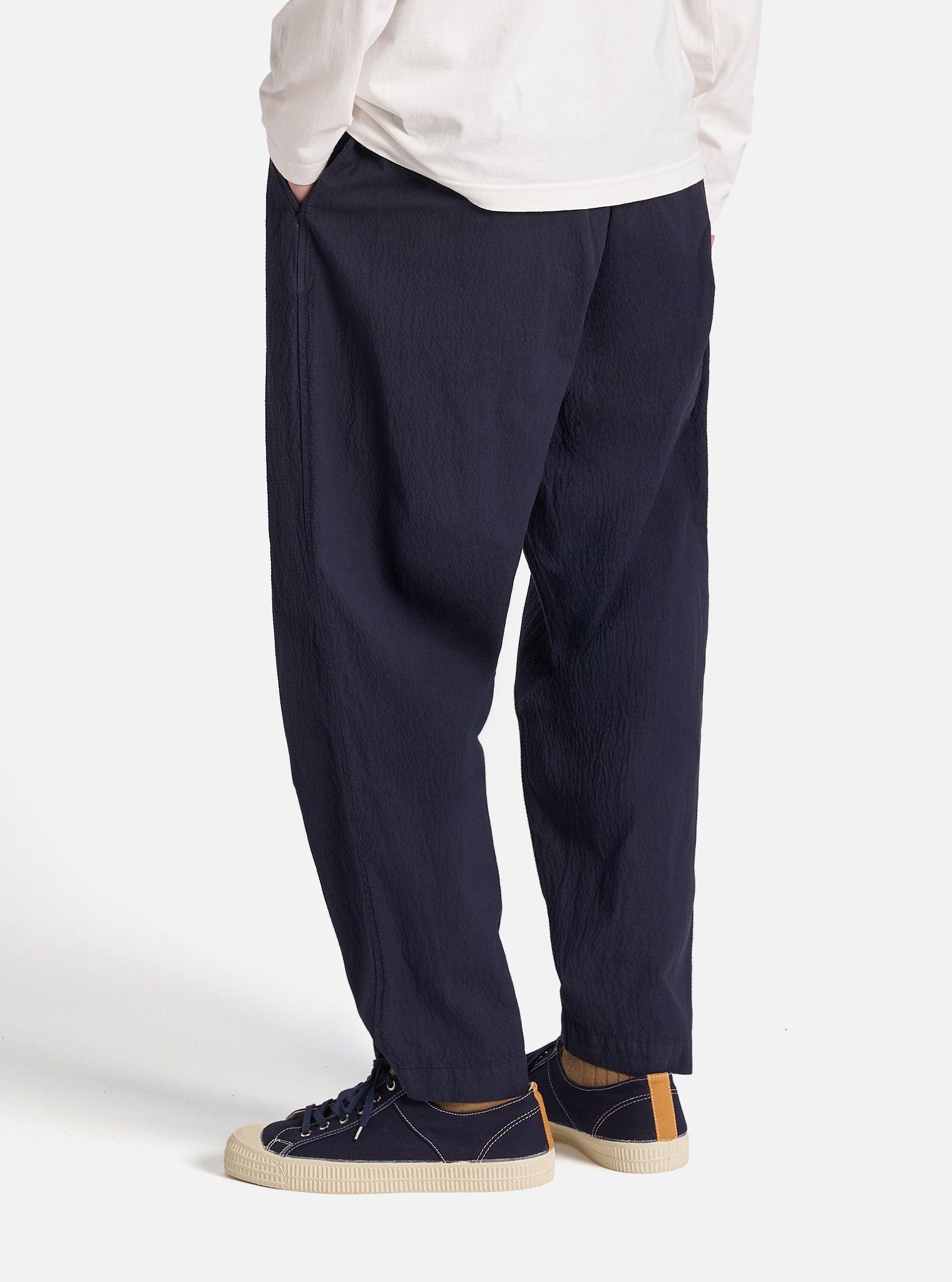 Universal Works Pleated Track Pant in Navy Seersucker II Product Image