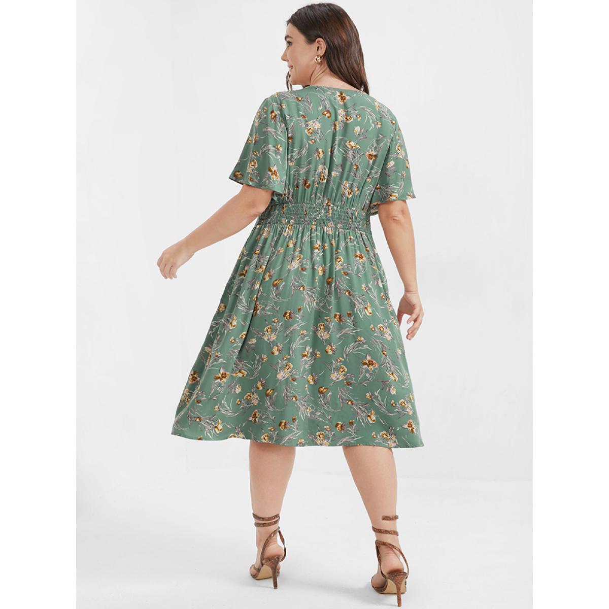 Plus Size Bloom Dress - Floral Flutter Shirred Pocket V Neck Dress Green Women Casual Gathered V-neck Short sleeve Curvy Midi Dress BloomChic 14-16/1X Product Image