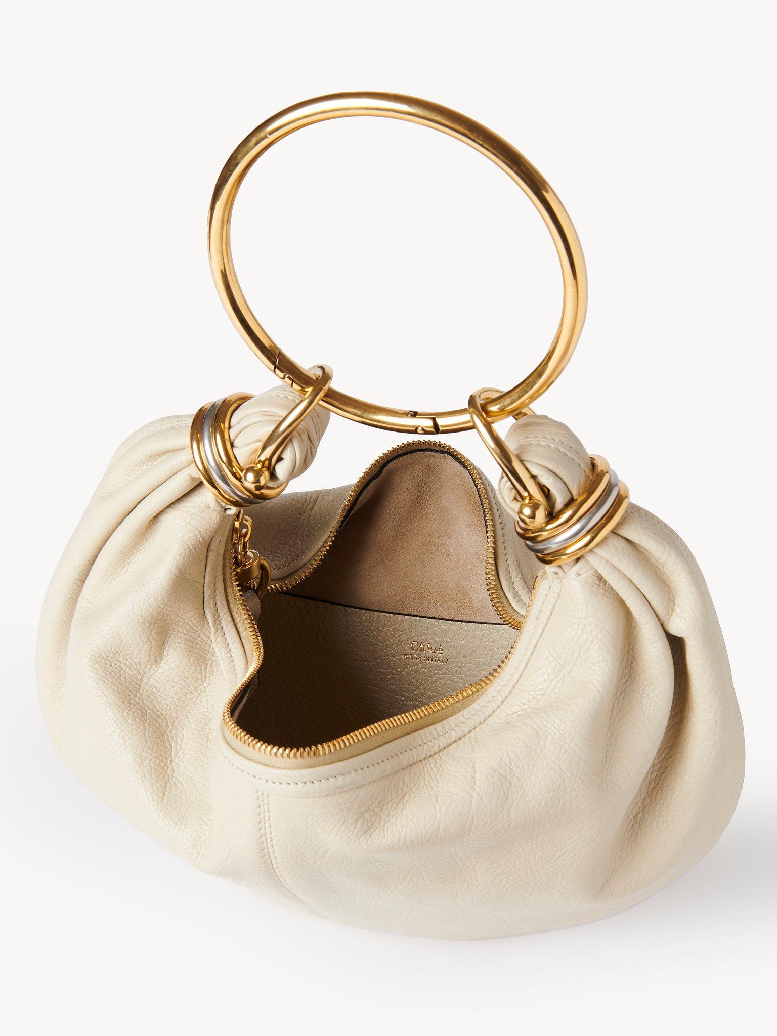 Small Bracelet Hobo bag in grained leather Product Image
