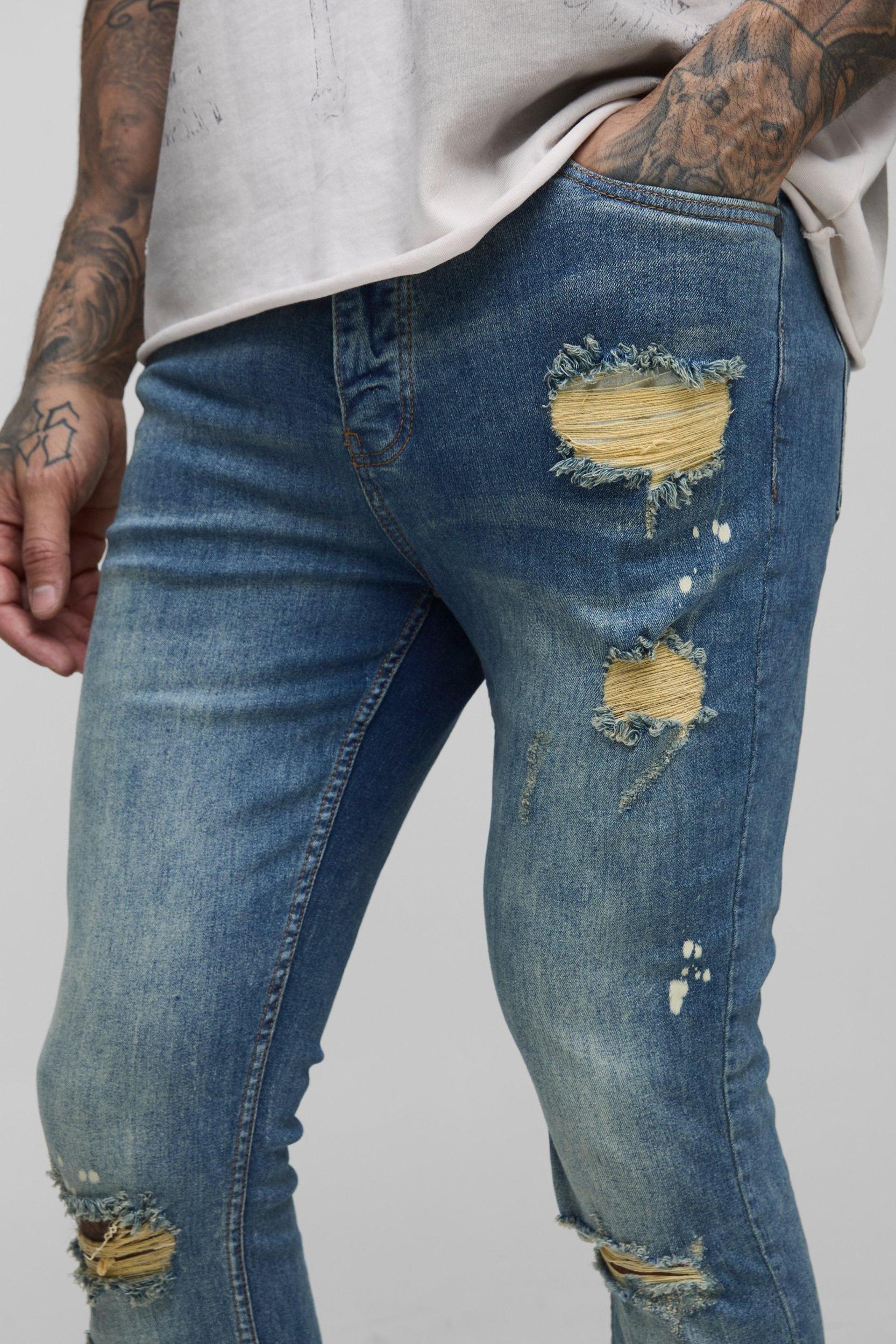 Tall Skinny All Over Ripped Bleached Paint Splatter Jeans | boohooMAN USA Product Image