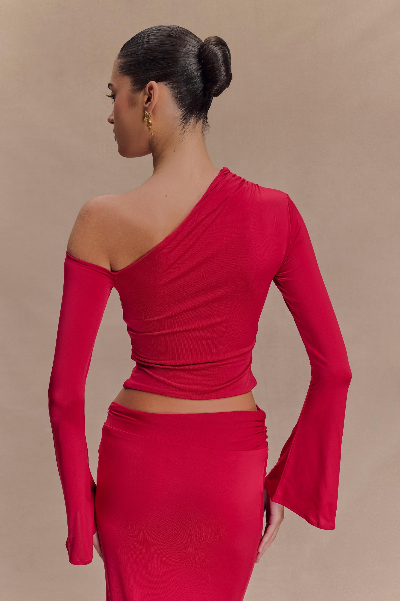 Ainsley Asymmetrical Long Sleeve Top With Floral Hardware - Fuchsia Pink Product Image