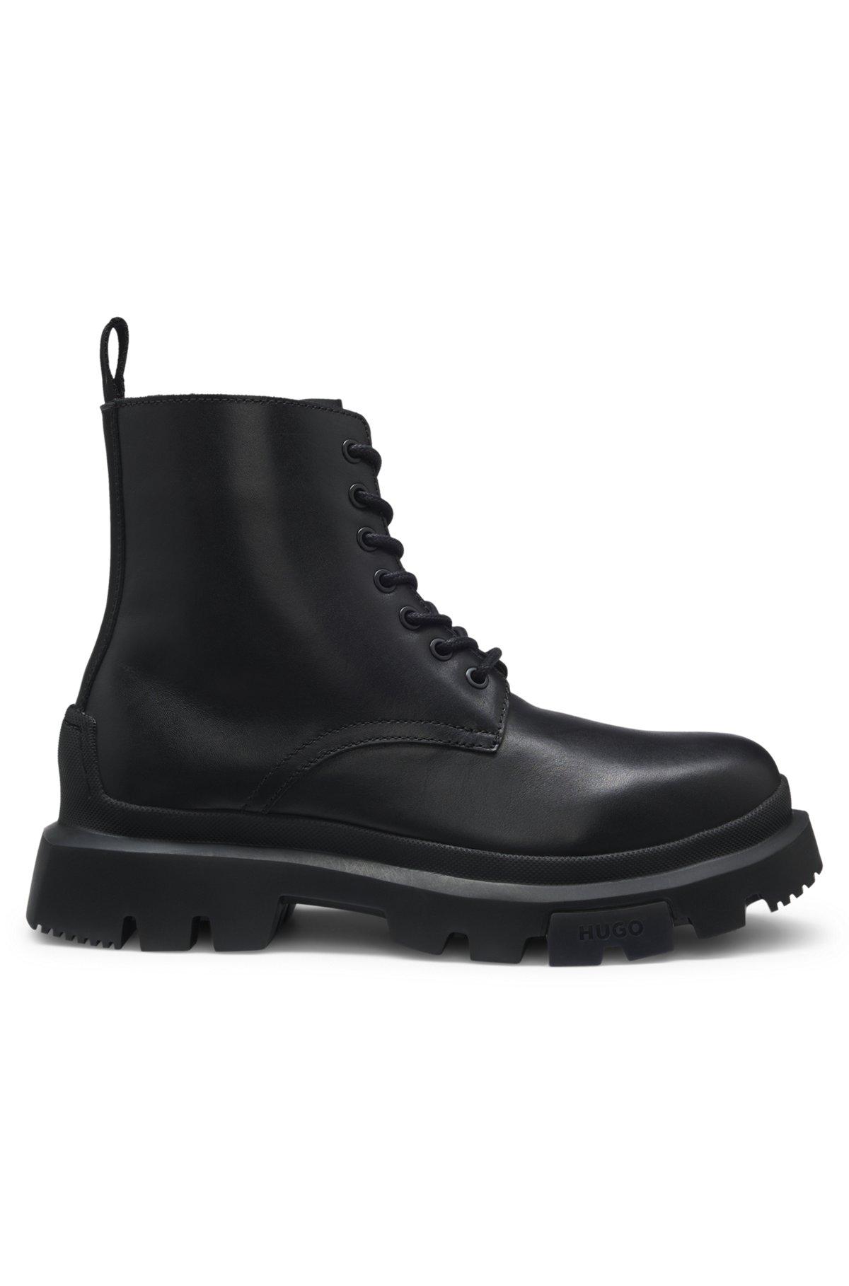 Lace-up calf-leather boots with lug sole Product Image