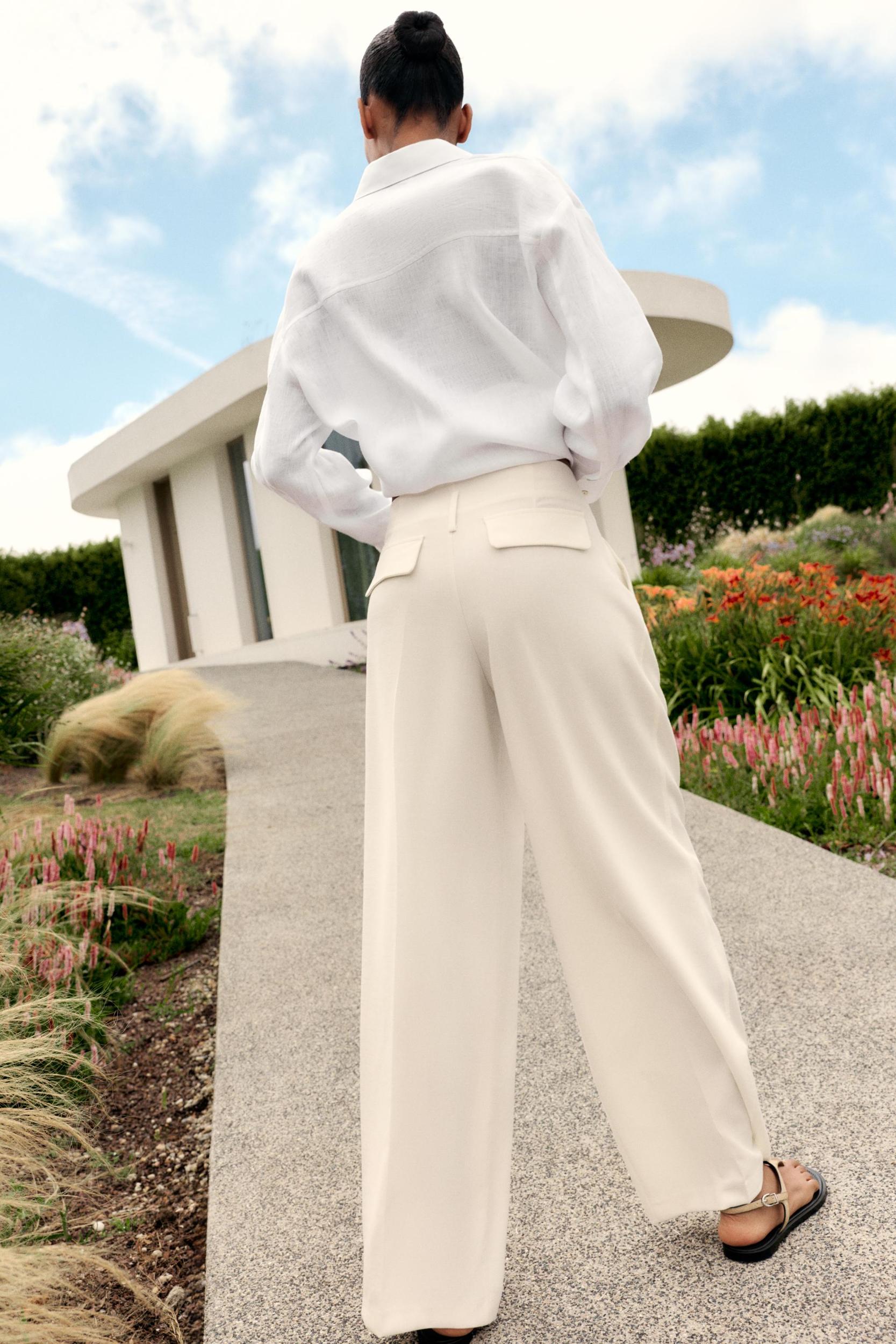 PLEATED WIDE LEG PANTS Product Image