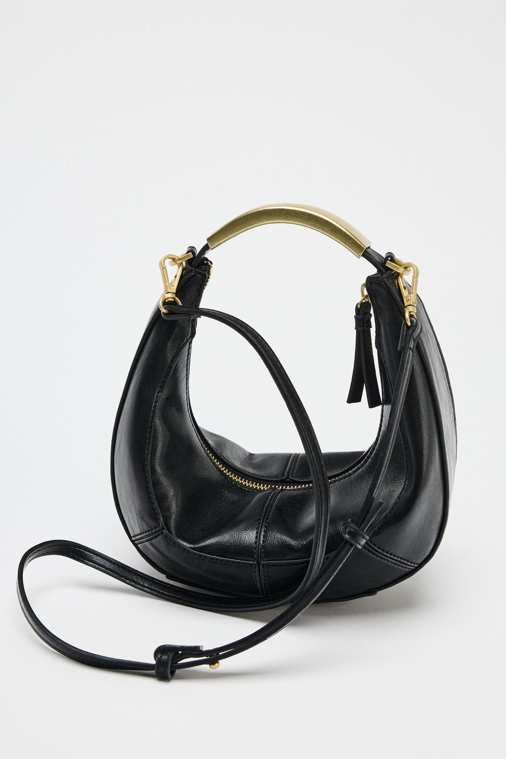 OVAL BAG WITH METAL HANDLE Product Image