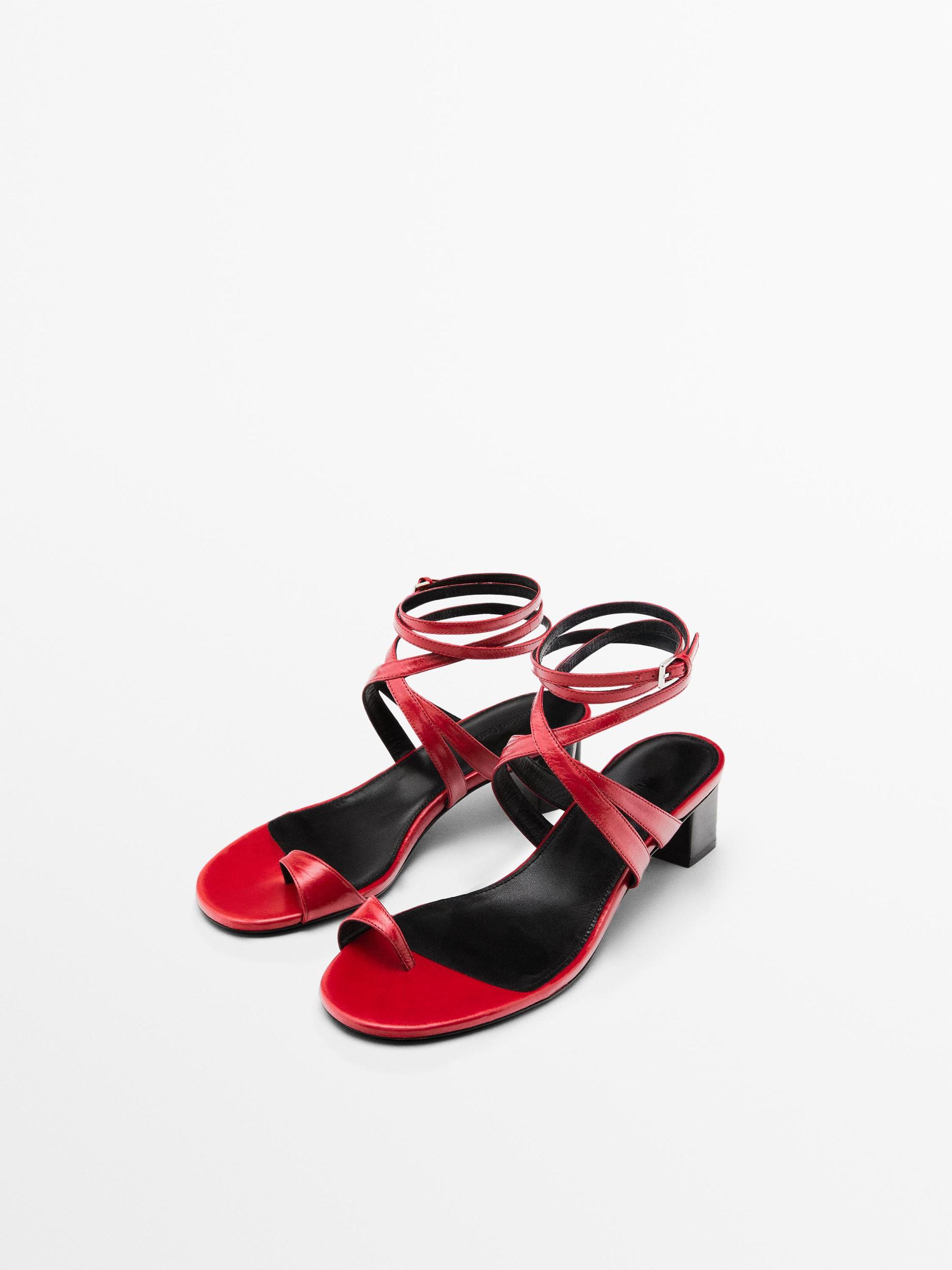 Leather sandals with criss-cross straps Product Image