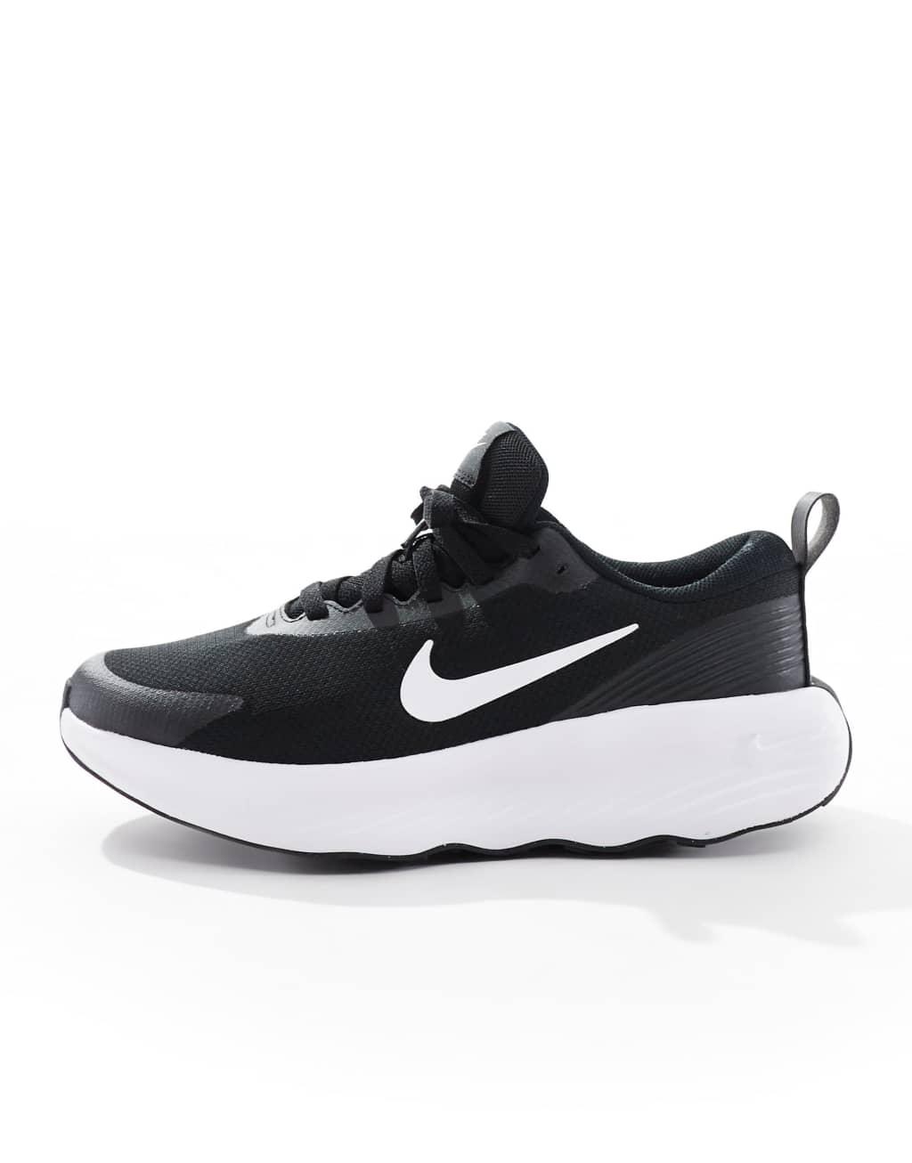 Nike Training Legend Essential 4 sneakers in black and white Product Image