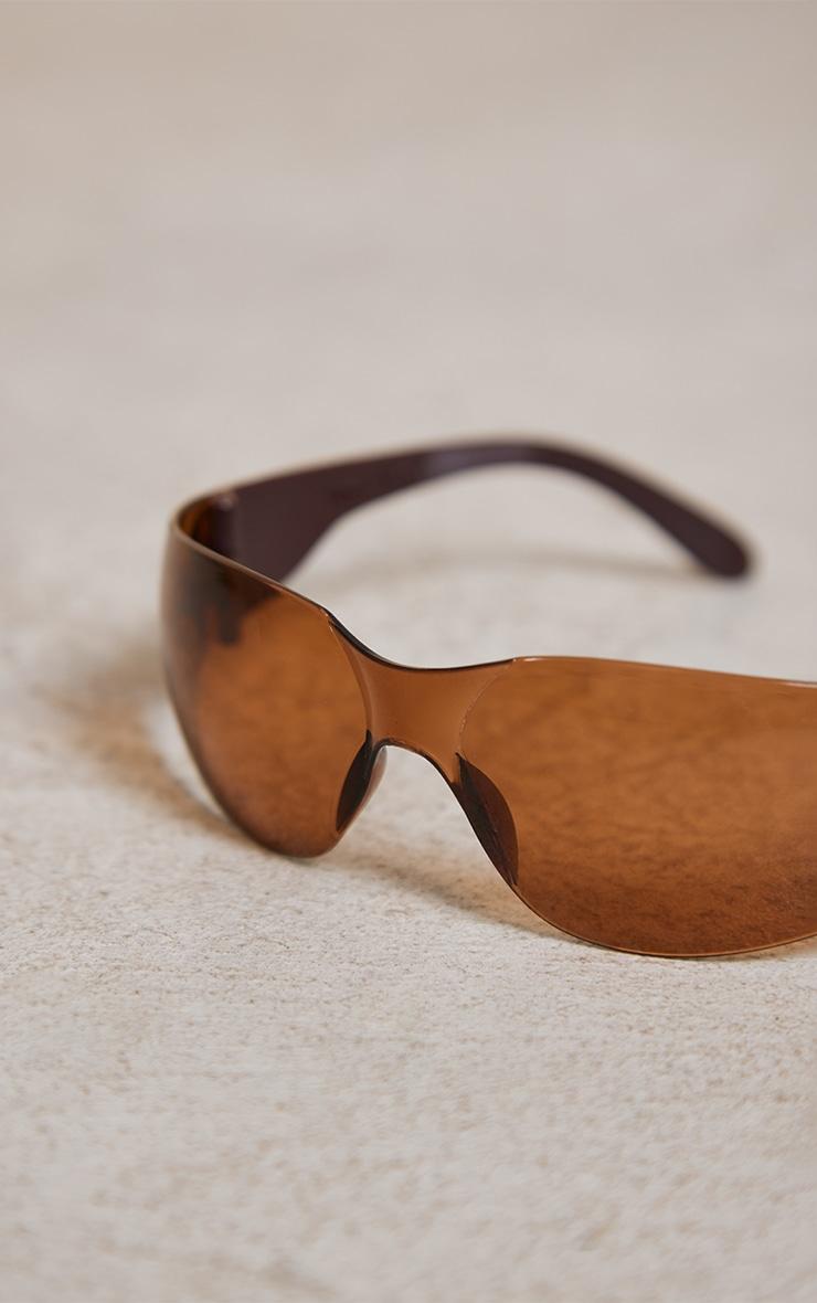 Brown Lens Frameless Sporty Visor Sunglasses Product Image