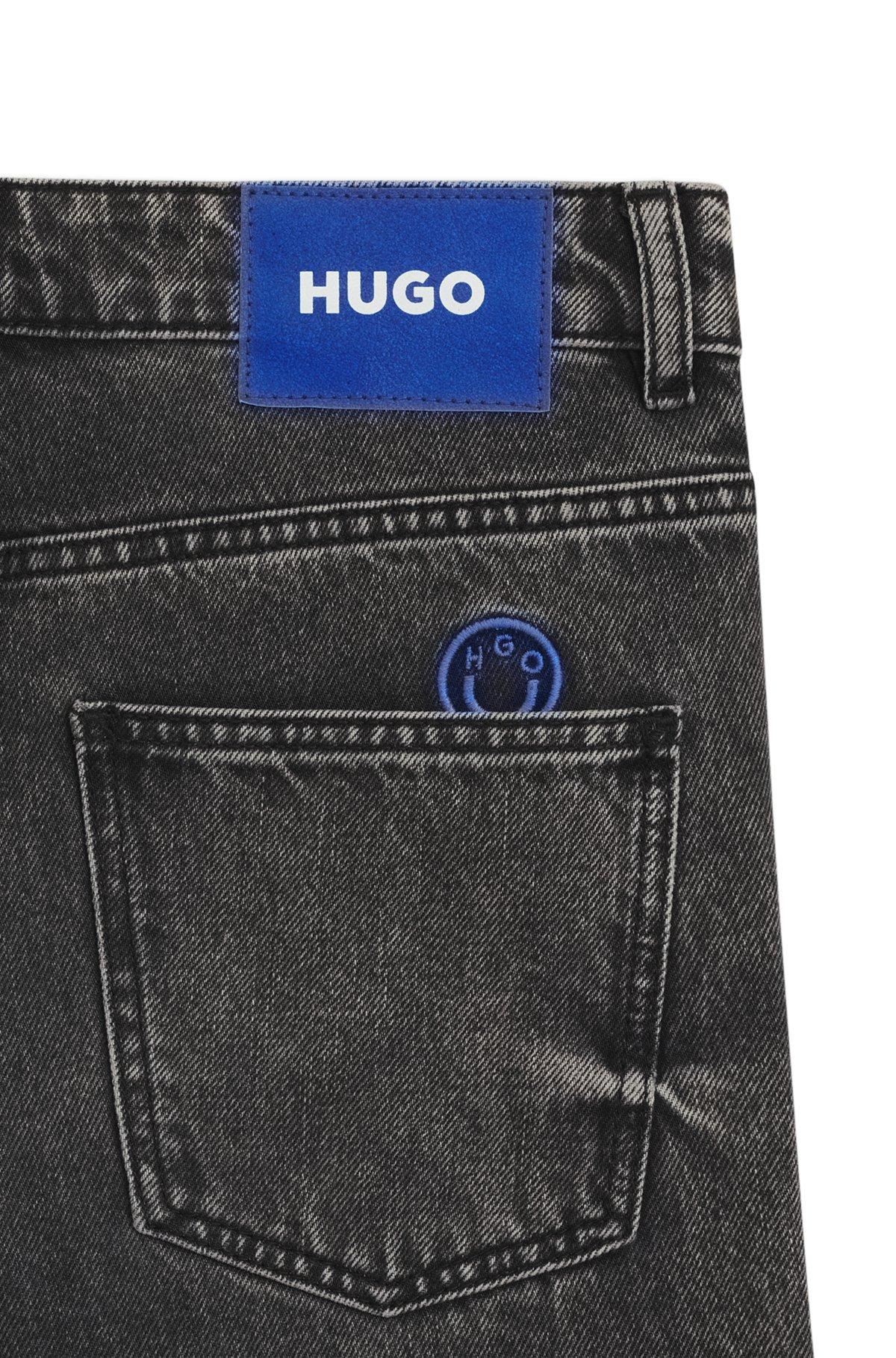 HUGO - Relaxed-fit jeans in distressed rigid denim - Black Product Image