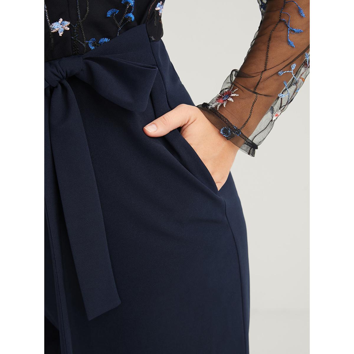 Plus Size DarkBlue Solid Pocket Embroidered Mesh Sleeve Knotted Jumpsuit Women Glamour Long Sleeve Round Neck Going out Loose Jumpsuits BloomChic 14-16/1X Product Image