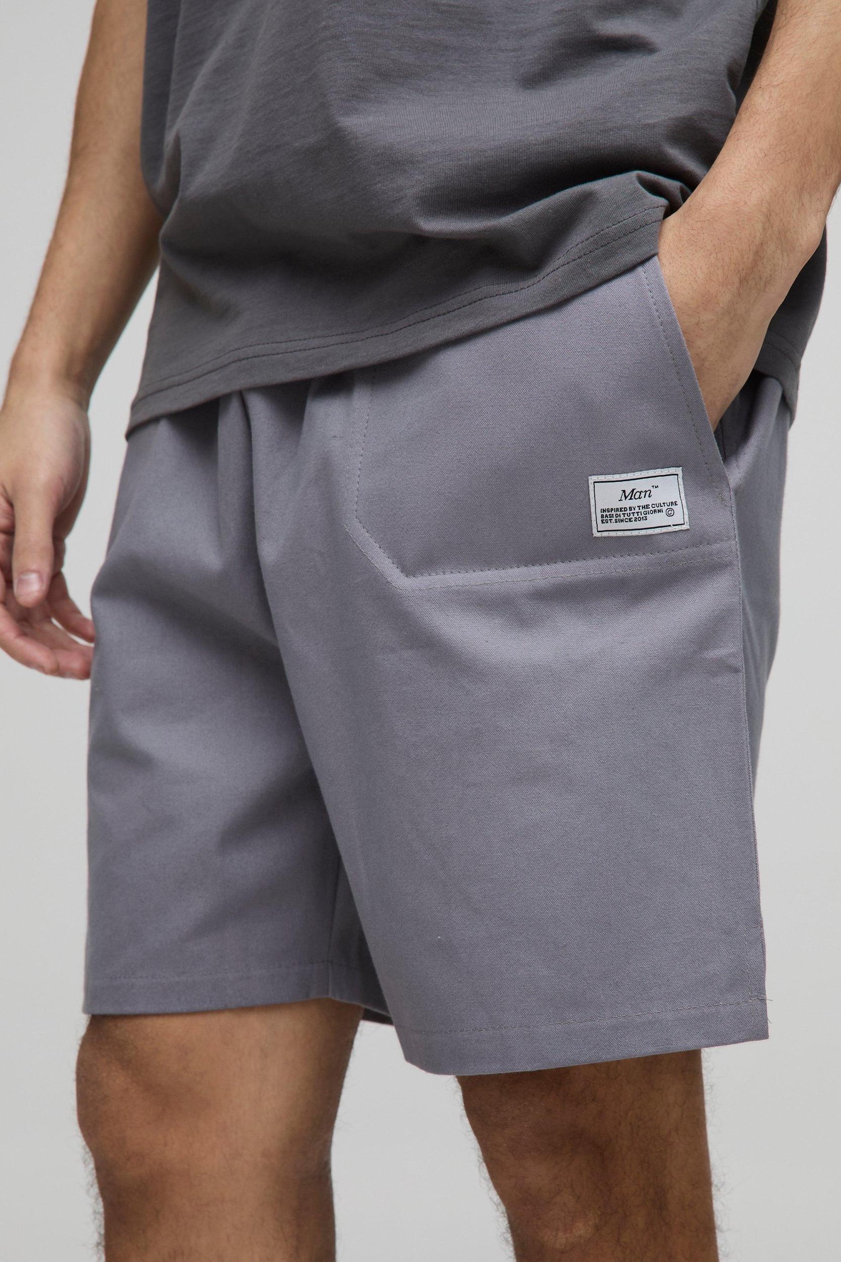 Elasticated Waist Relaxed Woven Tab Canvas Shorts | boohooMAN USA Product Image