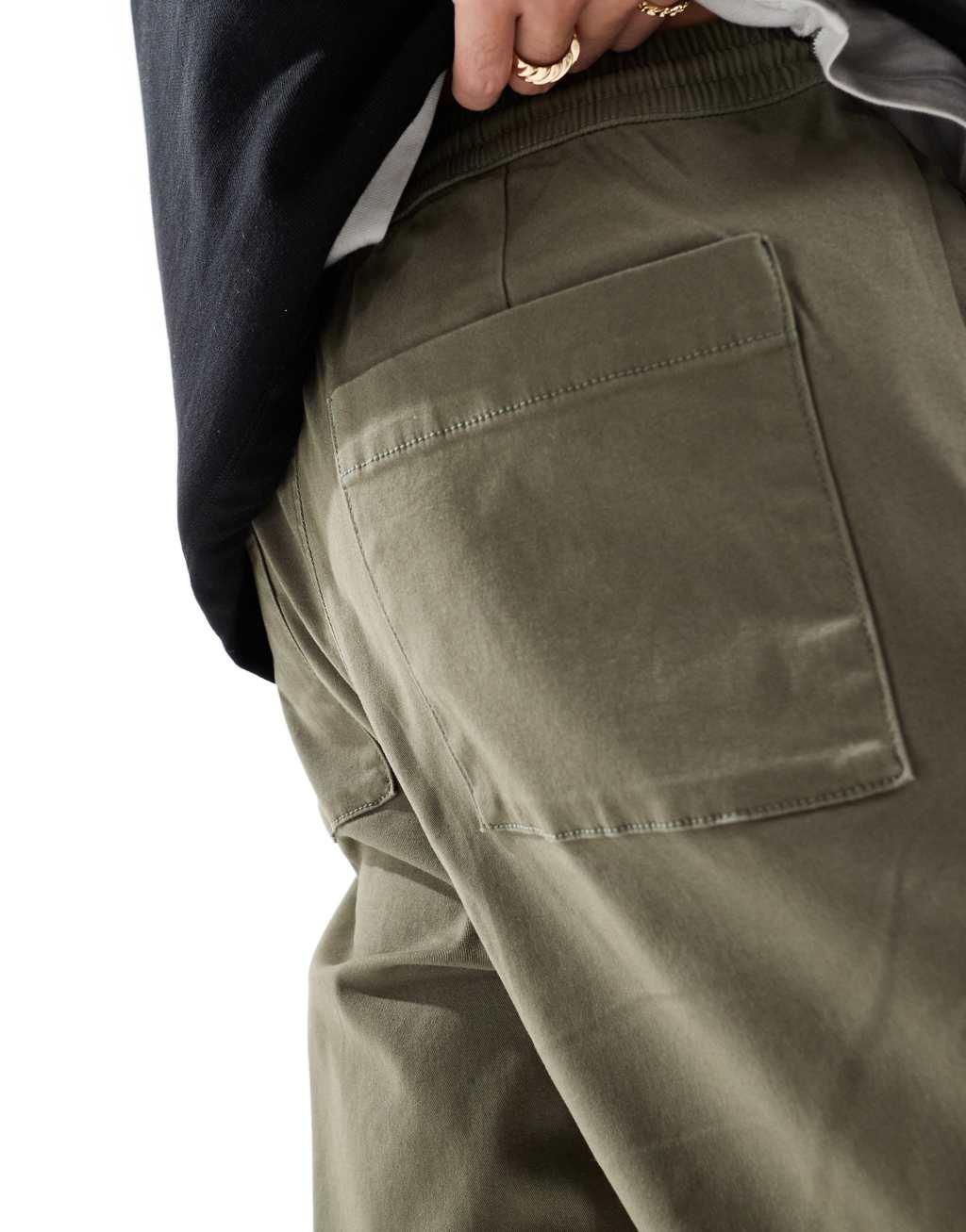 ASOS DESIGN tapered pull on chino with elastic waist in khaki Product Image