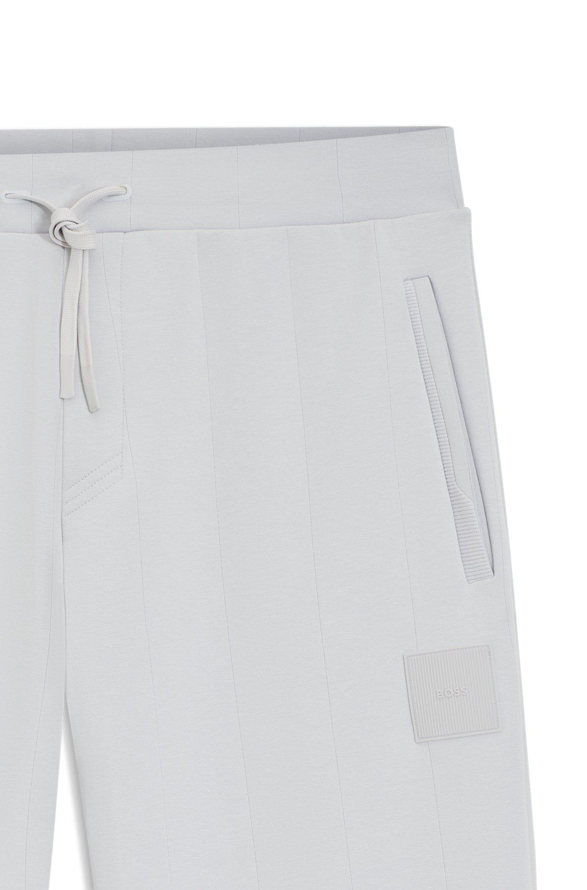 Tracksuit bottoms in a drop-needle cotton Product Image