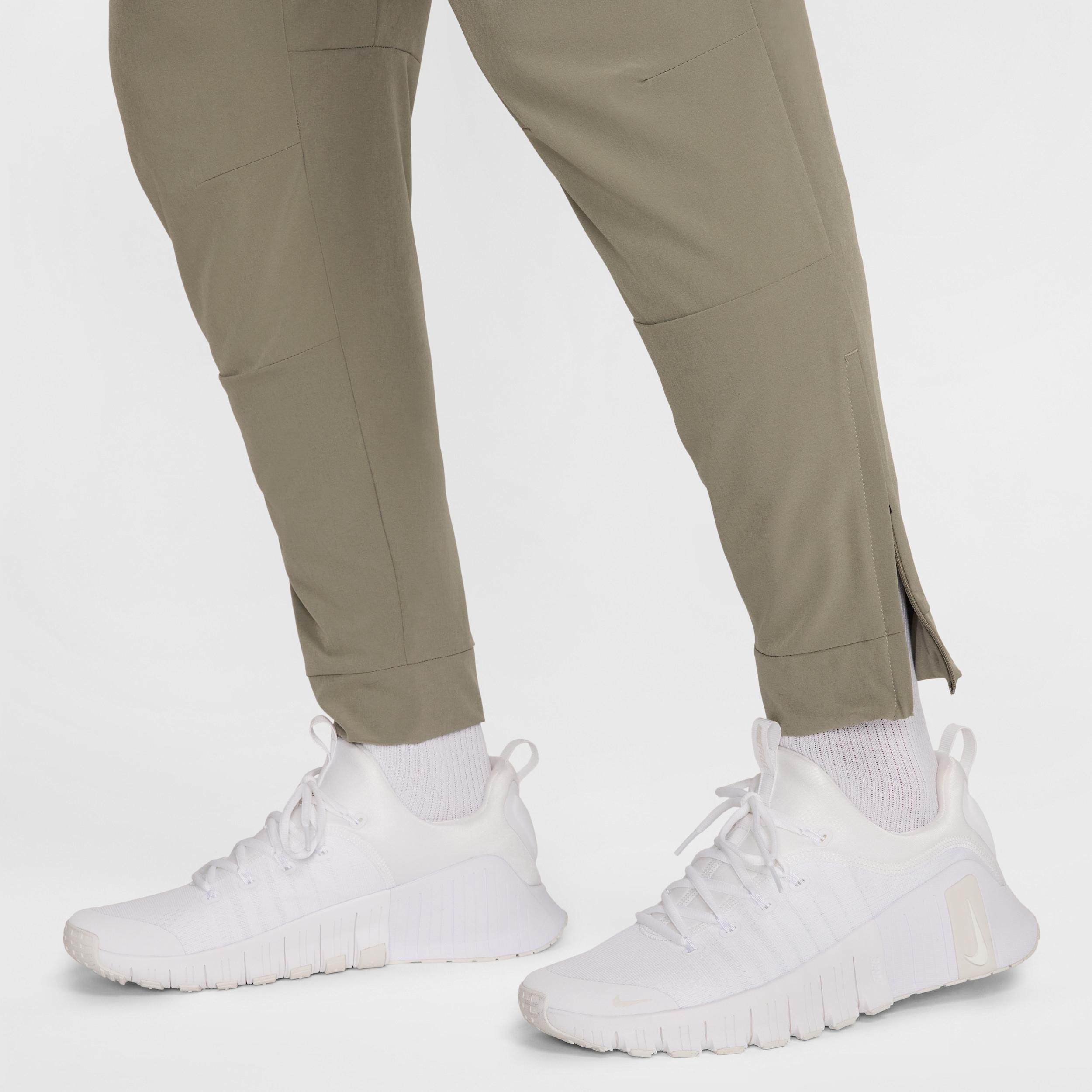 Nike Mens Unlimited Dri-FIT Zippered Cuff Versatile Pants | FB7548-320 Product Image