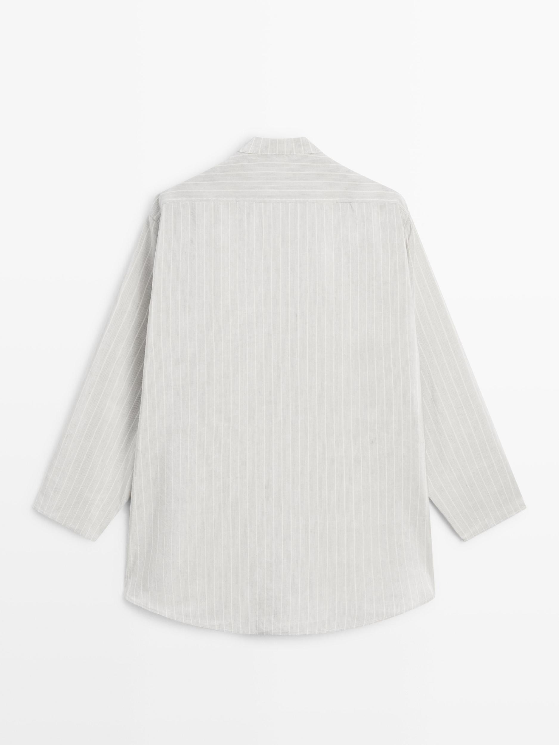 Striped oversize blouse with stand collar Product Image