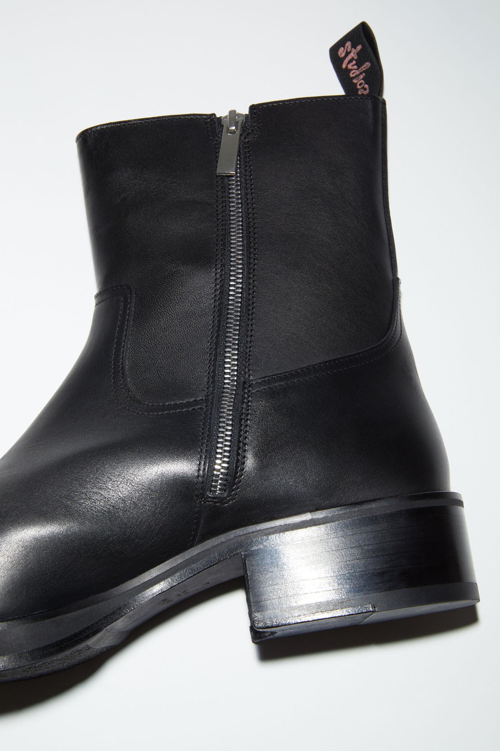 Glossed low leather boots Product Image