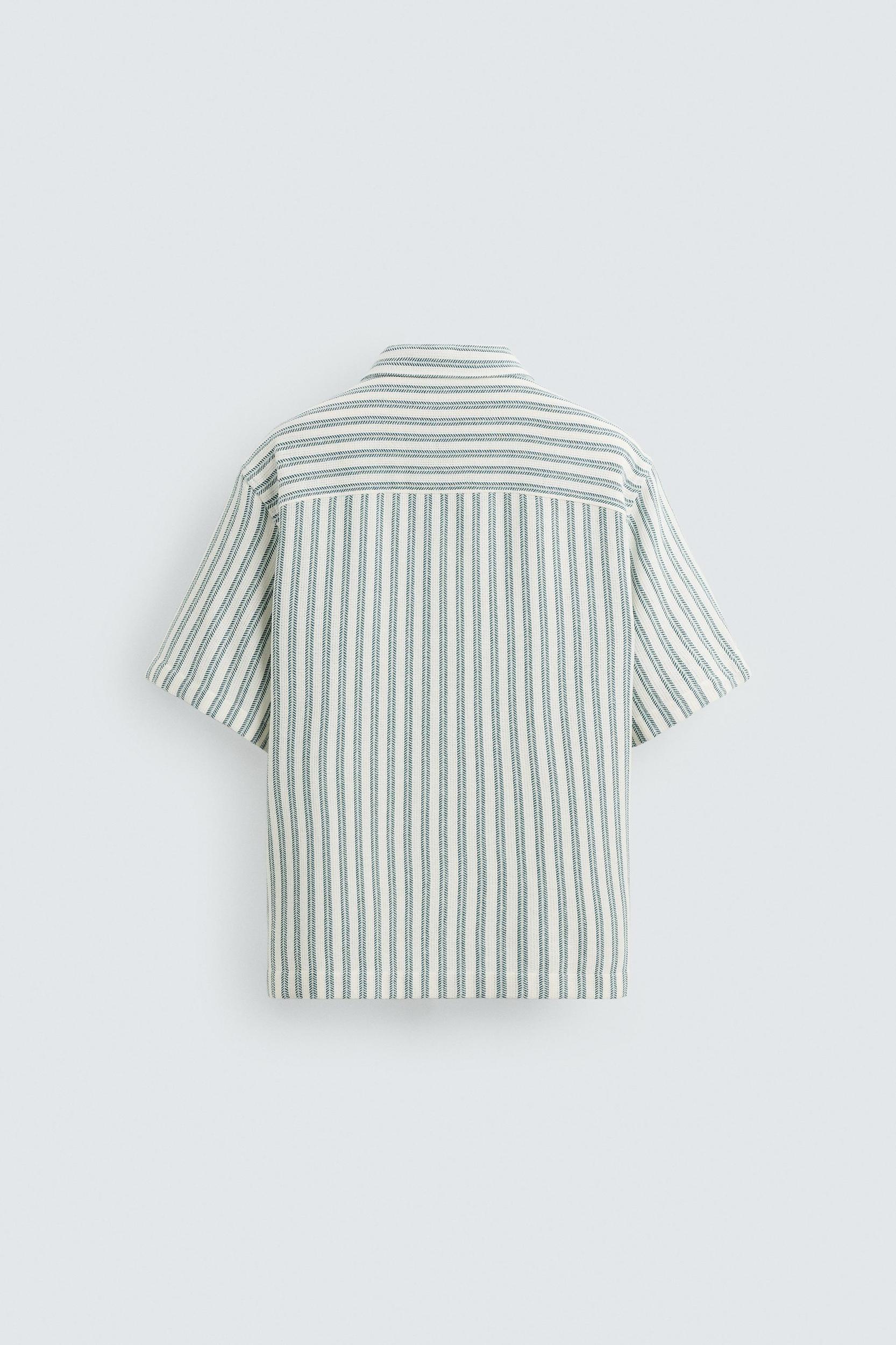 HERRINGBONE TEXTURED POLO SHIRT Product Image